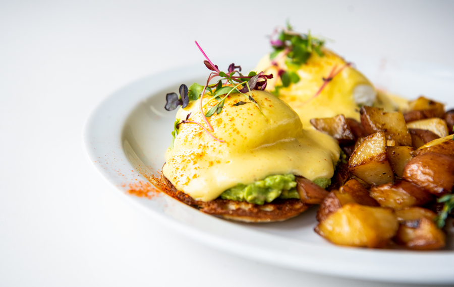 Order Eggs Benedict food online from Society Kitchen store, Santa Monica on bringmethat.com