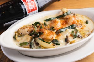 Order 67. Queso Fundido with Shrimp food online from El Vaquero store, Monroe on bringmethat.com