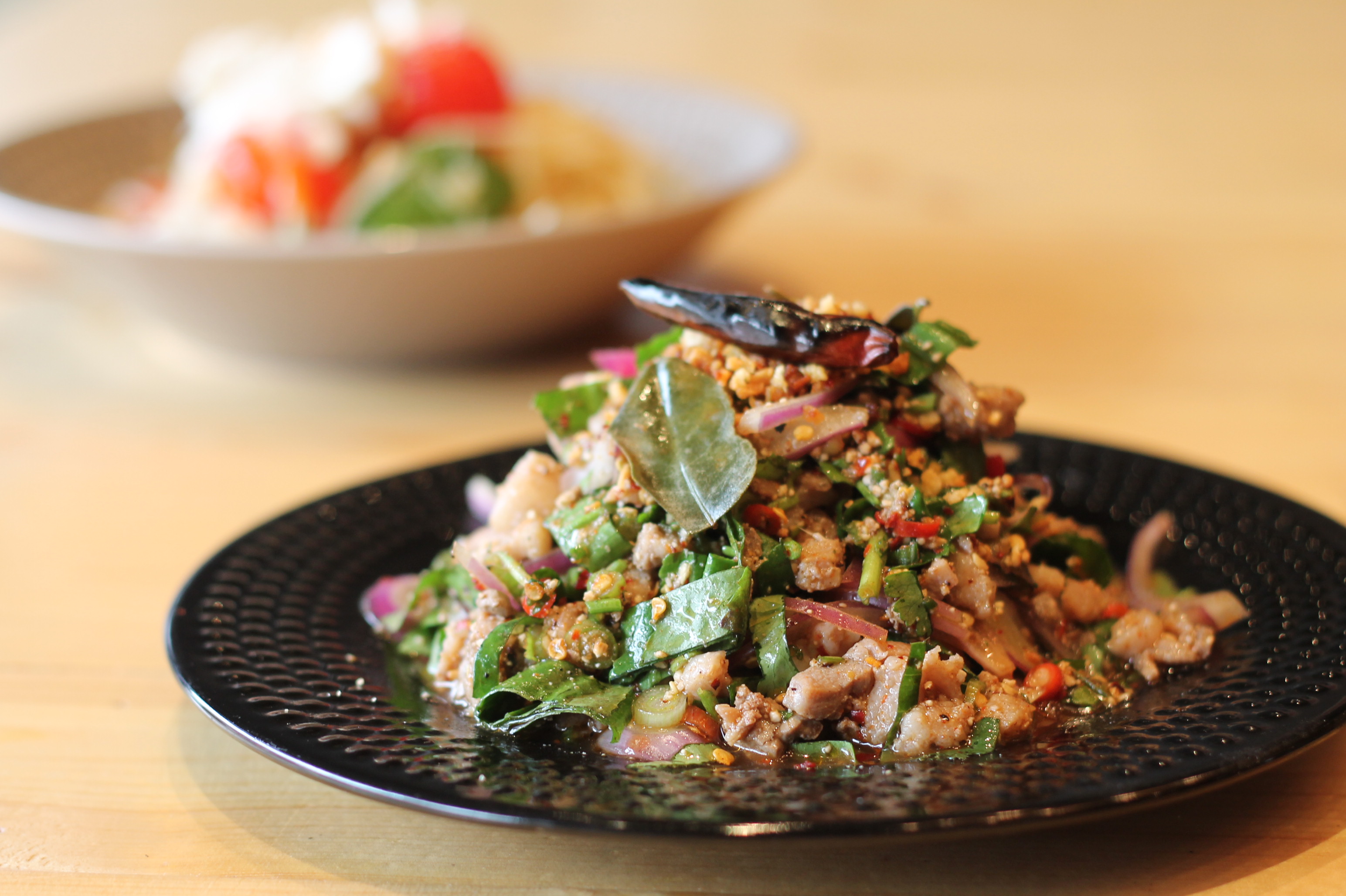 Order Larb Ped food online from Somtum Der store, New York on bringmethat.com