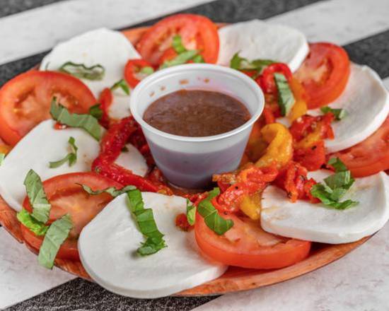 Order Fresh Mozzarella w/Roasted Peppers & Sliced Tomatoes food online from Doughboys Pizzeria and Italian Restaurant store, Pembroke Pines on bringmethat.com