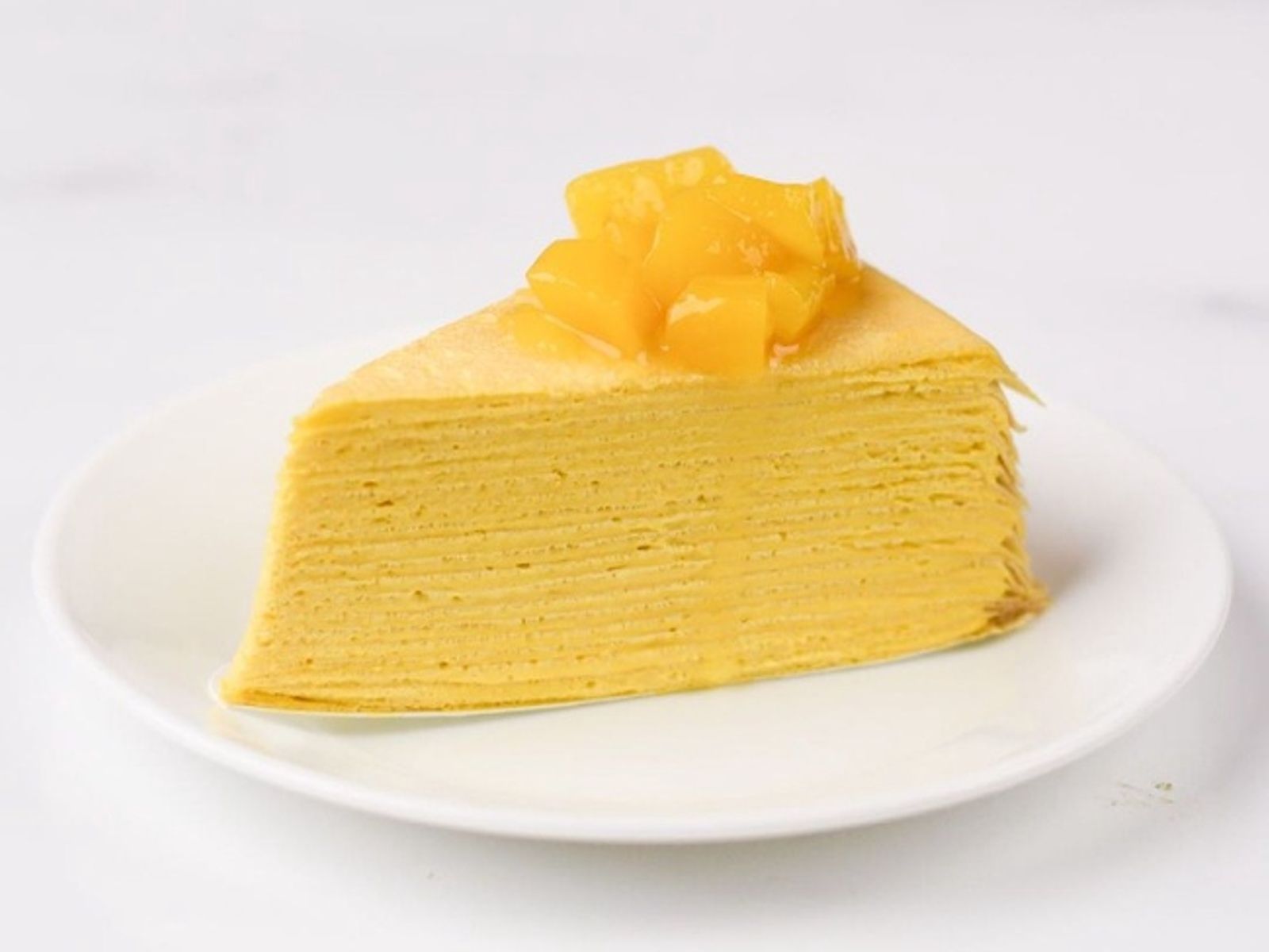 Order Mango Mille Crepes food online from T-Swirl Crepe store, New York on bringmethat.com