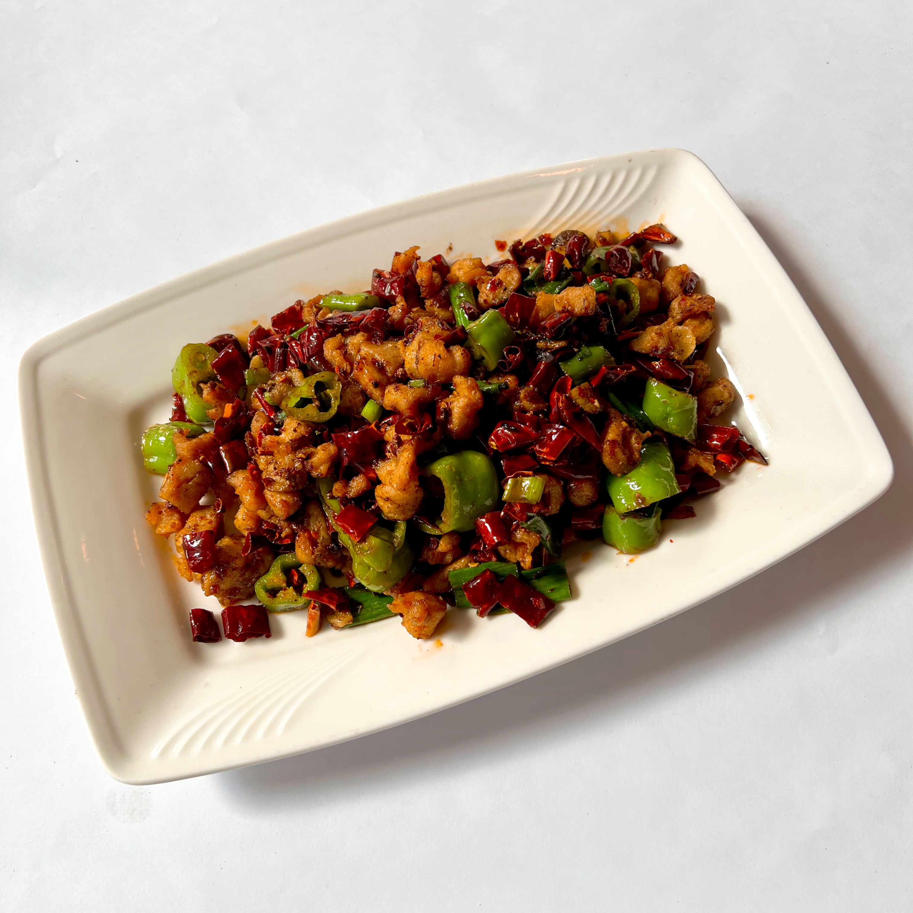 Order Diced Chicken with Dried Chili Peppers 三椒煸鸡丁 food online from Ollie's Sichuan store, New York on bringmethat.com