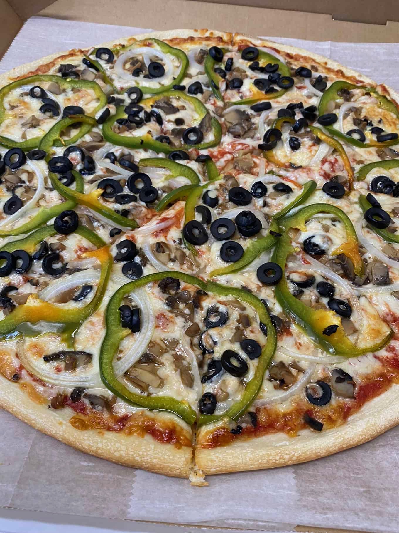Order 18" Veggie Special food online from Famous Pizza store, Paramus on bringmethat.com