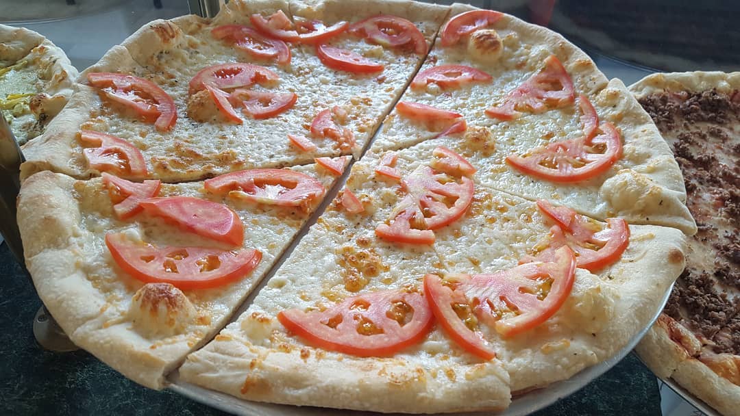 Order Tomato Garlic Pizza food online from Jo-Jo Pizza store, Richmond on bringmethat.com