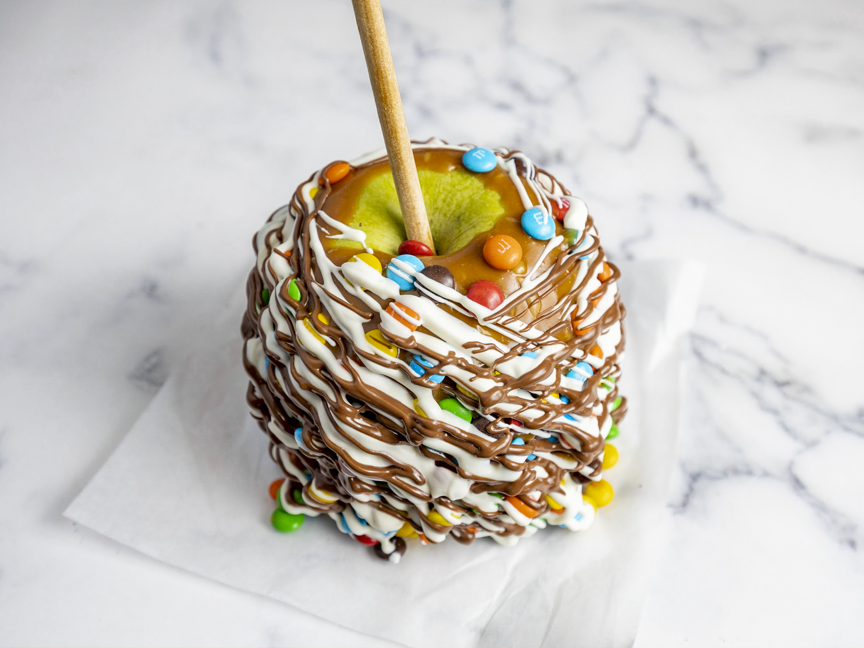 Order M and M Caramel Apple food online from San Francisco Chocolate Store store, San Francisco on bringmethat.com