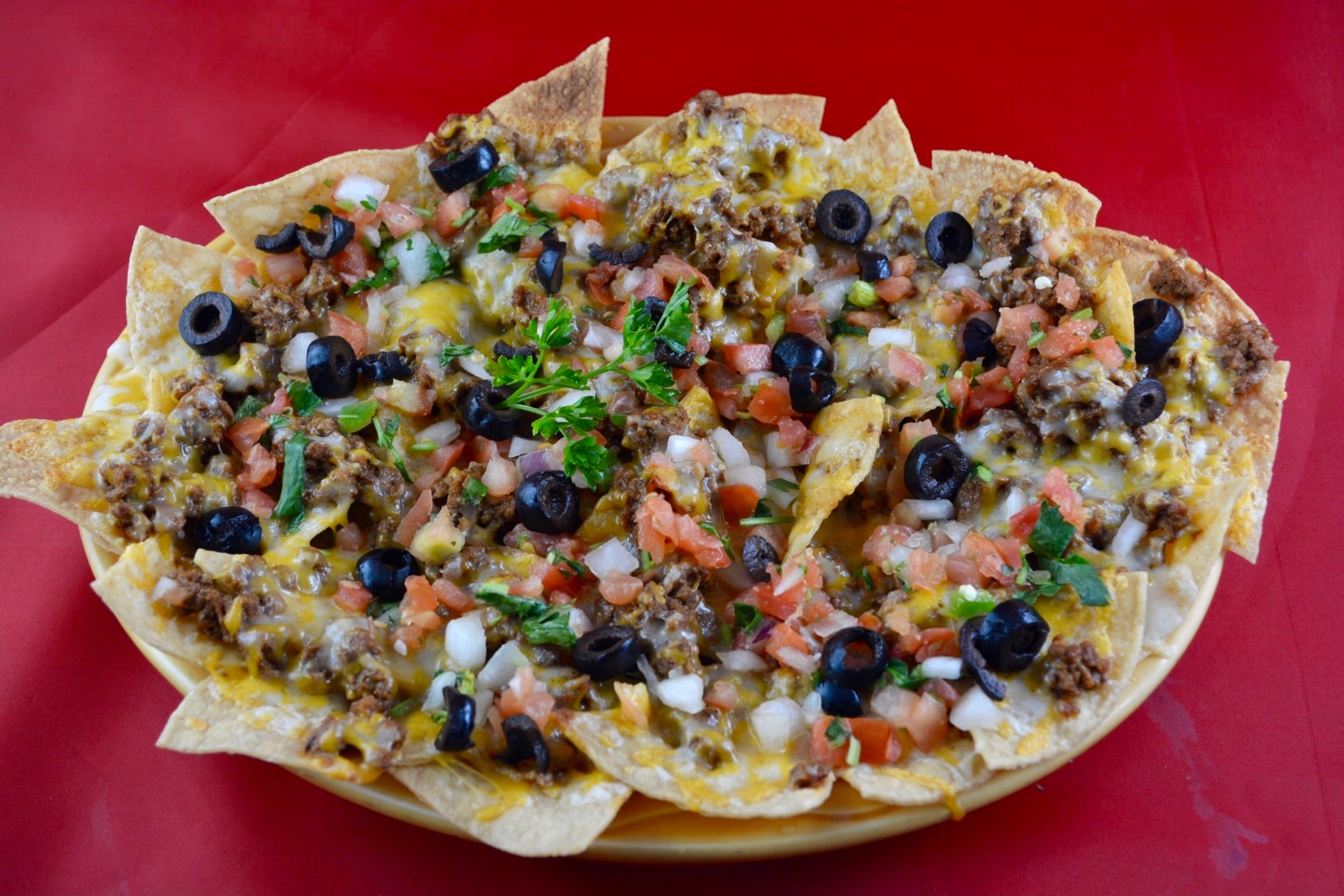 Order Nachos Con Carne food online from Jalapenos Mexican Restaurant Eagle River store, Eagle River on bringmethat.com