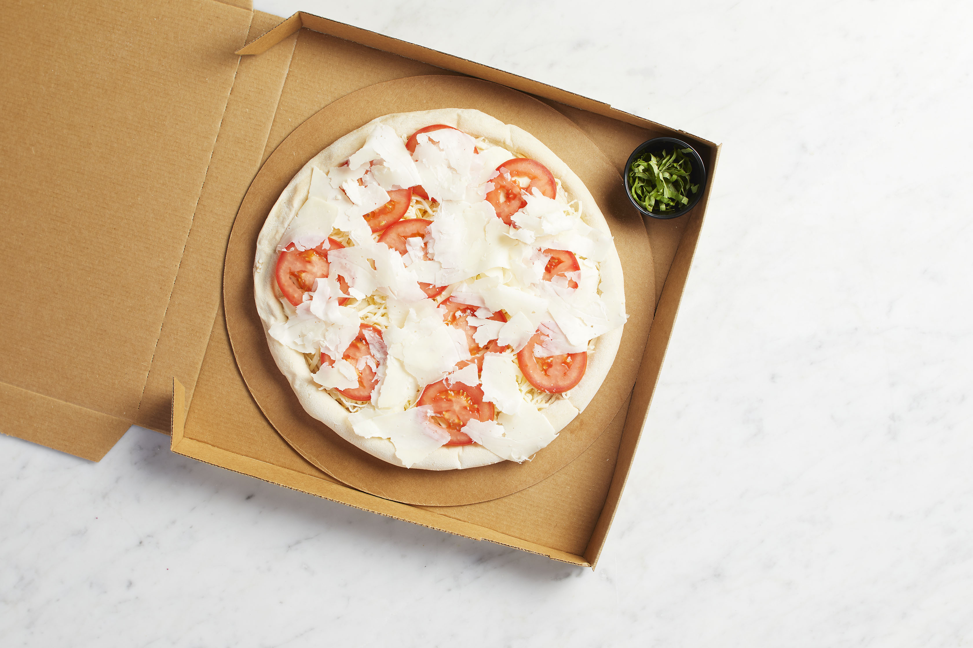 Order Take and Bake 5 Cheese and Fresh Tomato Pizza food online from California Pizza Kitchen - River City Dr store, Jacksonville on bringmethat.com