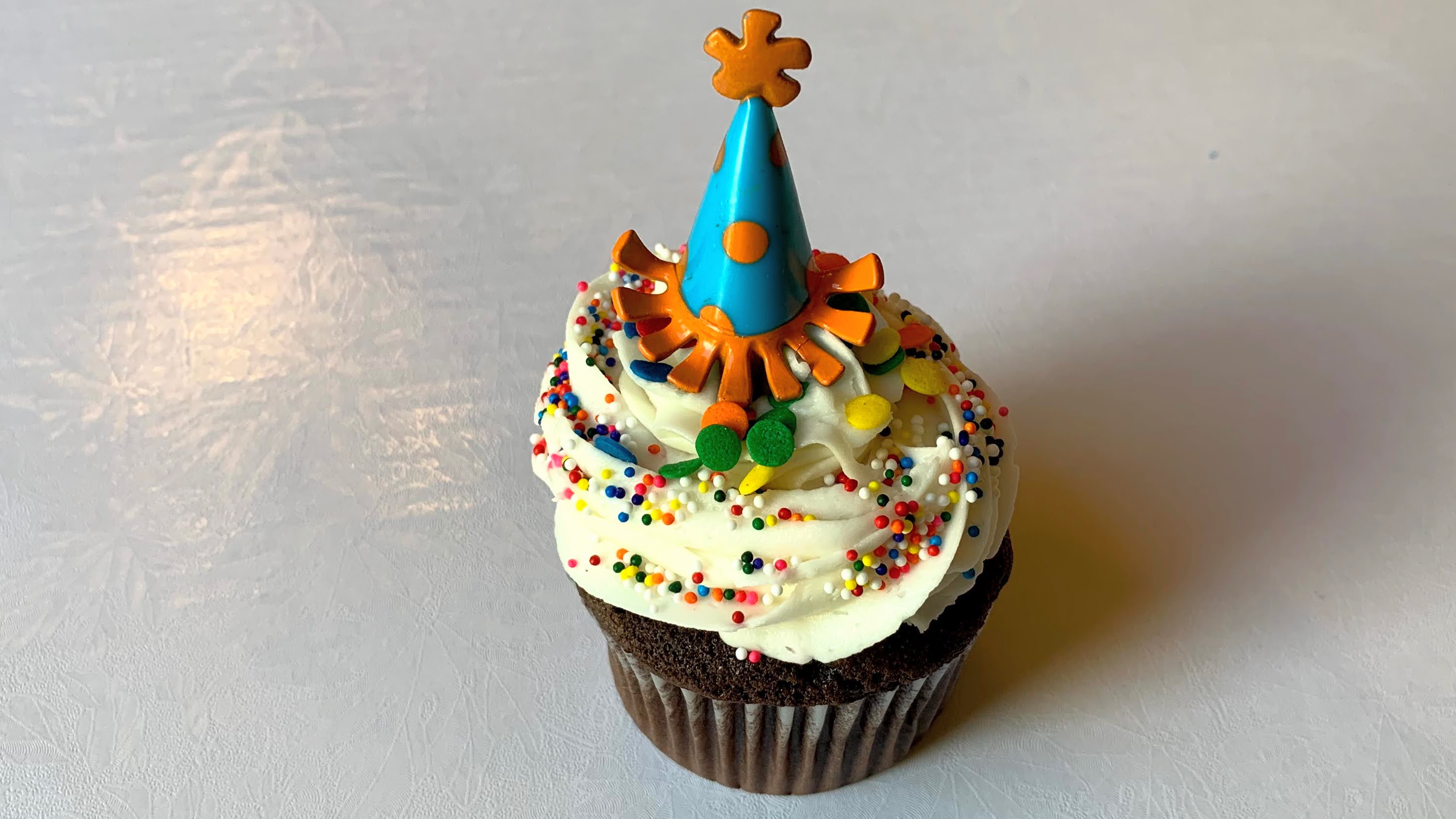 Order Celebration Cupcake  food online from Cake Delight store, Livermore on bringmethat.com