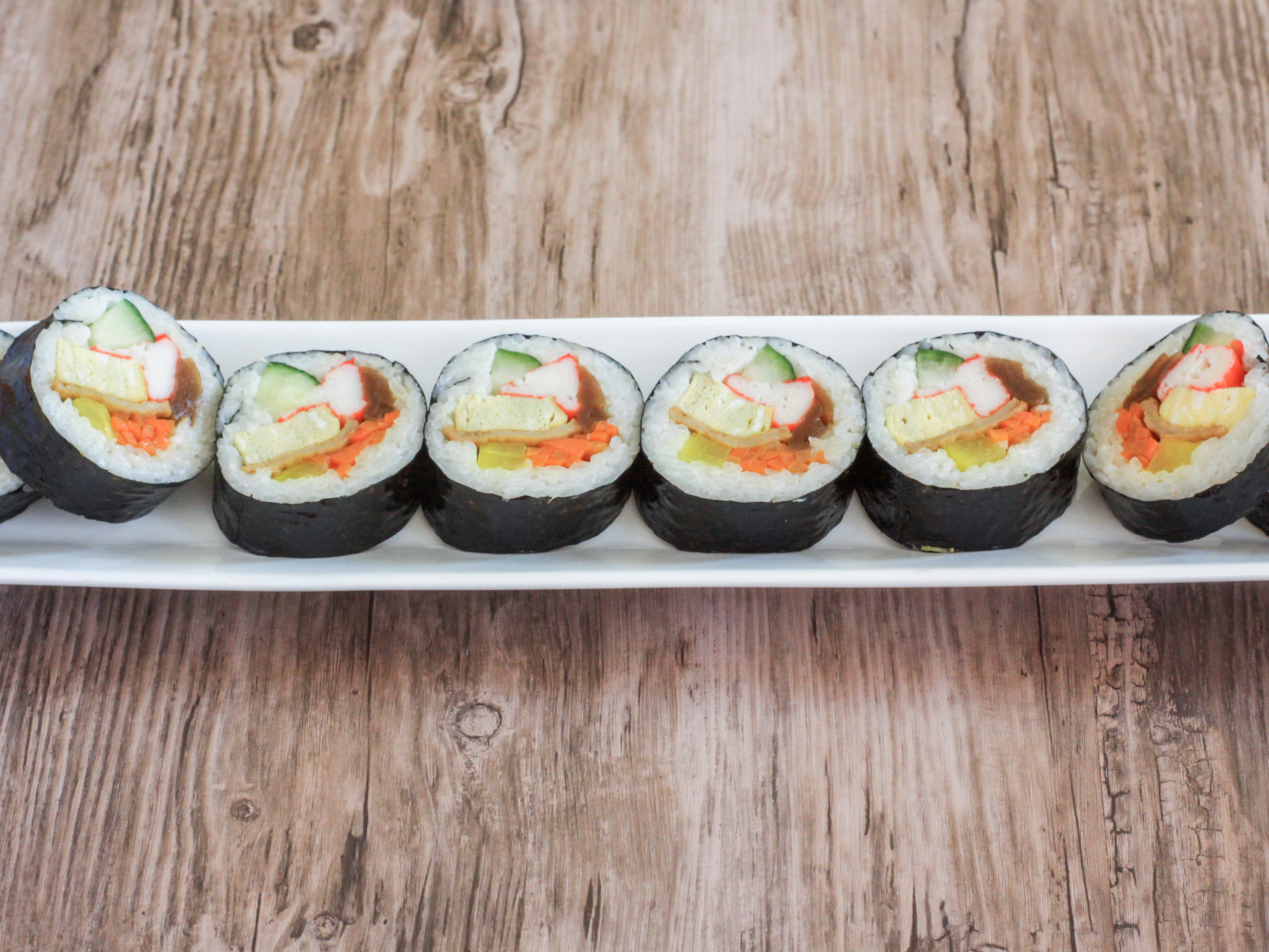 Order 20. Kimbap food online from Spoon House store, Champaign on bringmethat.com