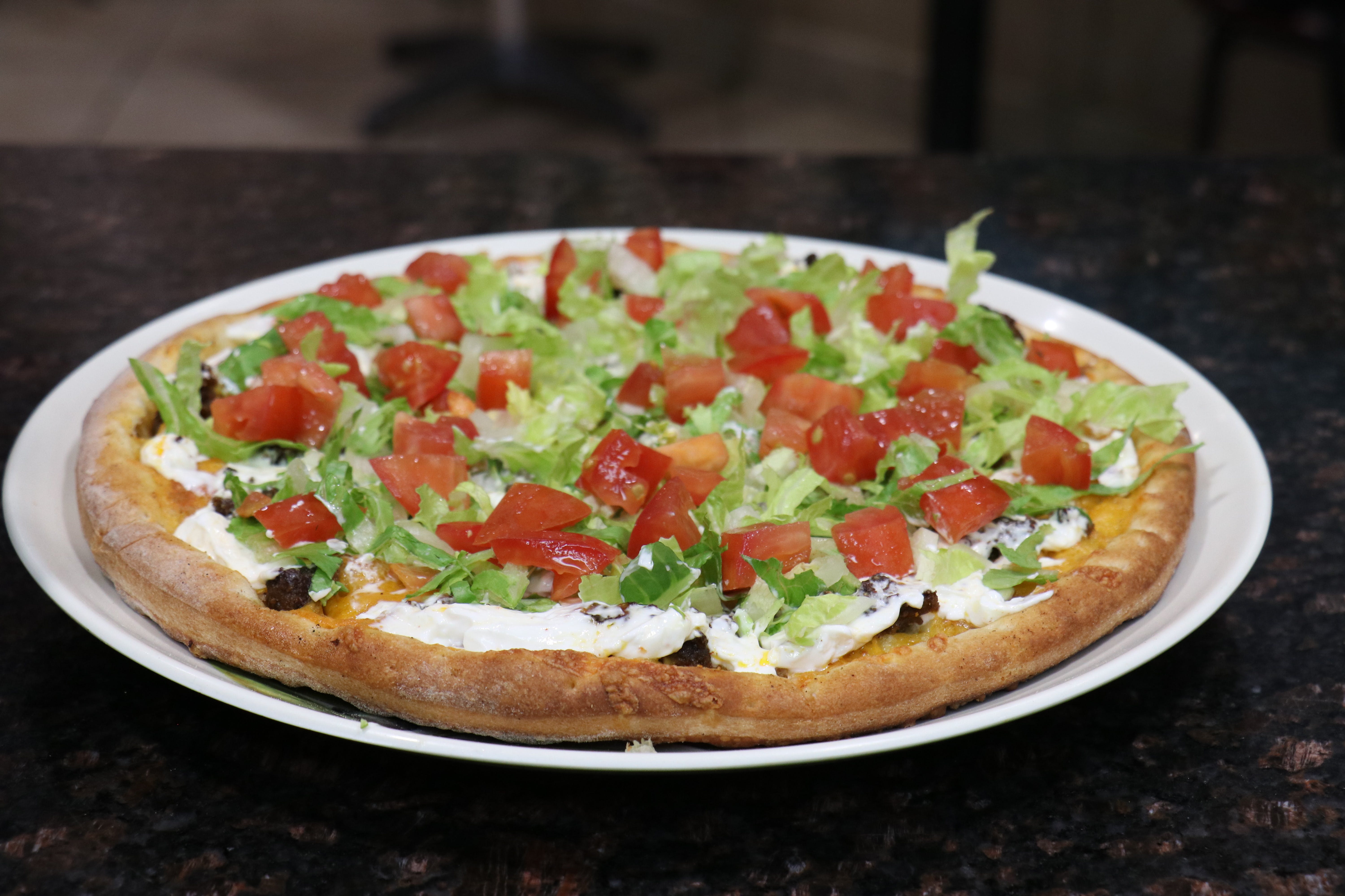Order Gyro (Greek Pizza) - Small 10'' food online from The Village Grille store, Great Falls on bringmethat.com