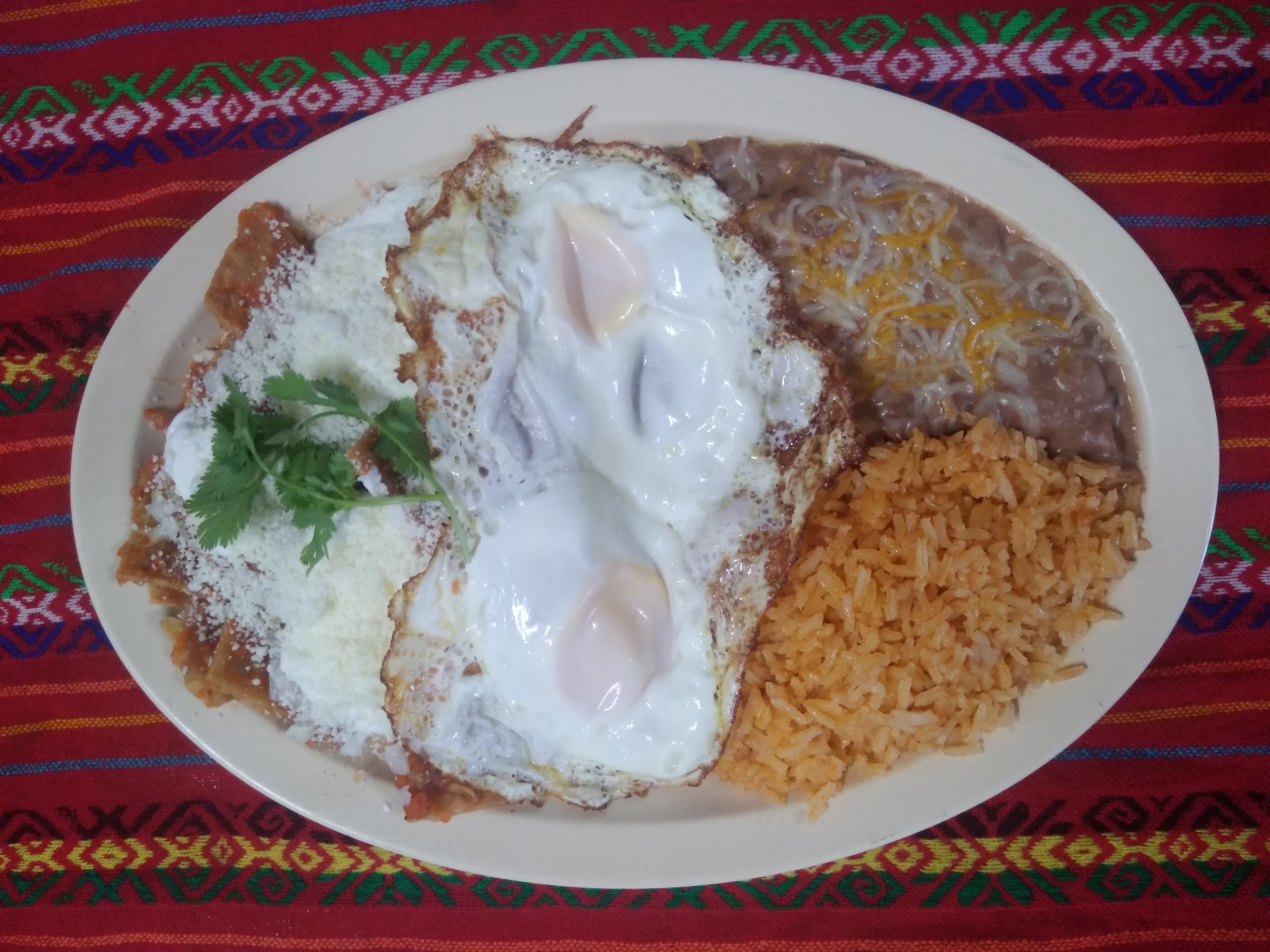 Order Breakfast Chilaquiles Plate food online from El Toro Grill Taqueria store, San Diego on bringmethat.com