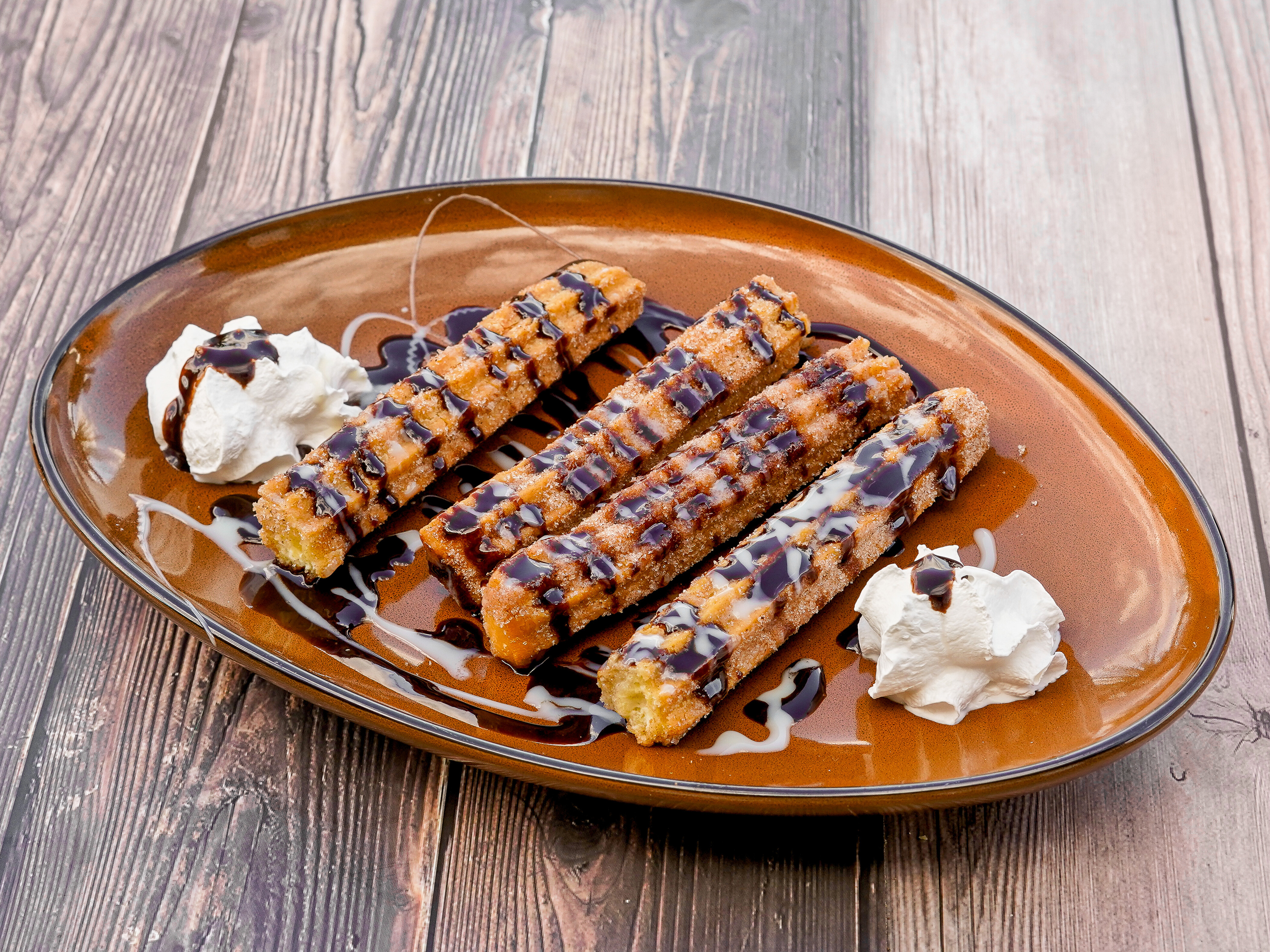Order Churros food online from El Caporal Mexican Grill store, Mason on bringmethat.com