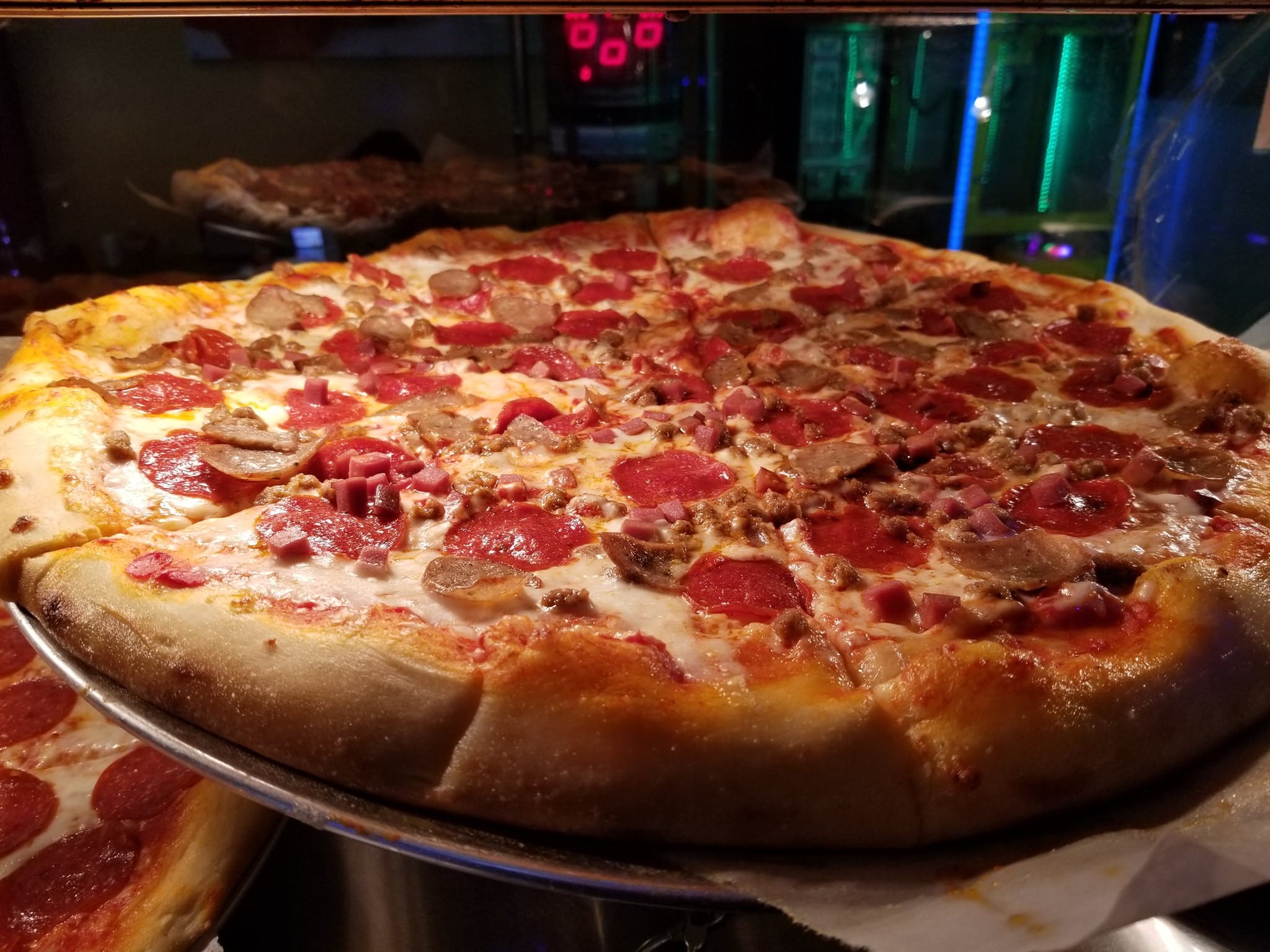 Order Meat Lover's Pizza - Medium 12'' (8 Slices) food online from Italian Pizza & Grill store, Daytona Beach on bringmethat.com