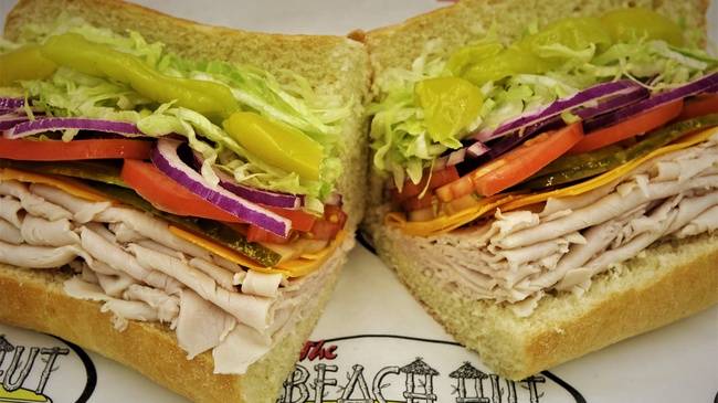 Order Turkey and Cheese food online from Beach Hut Deli store, Sacramento on bringmethat.com