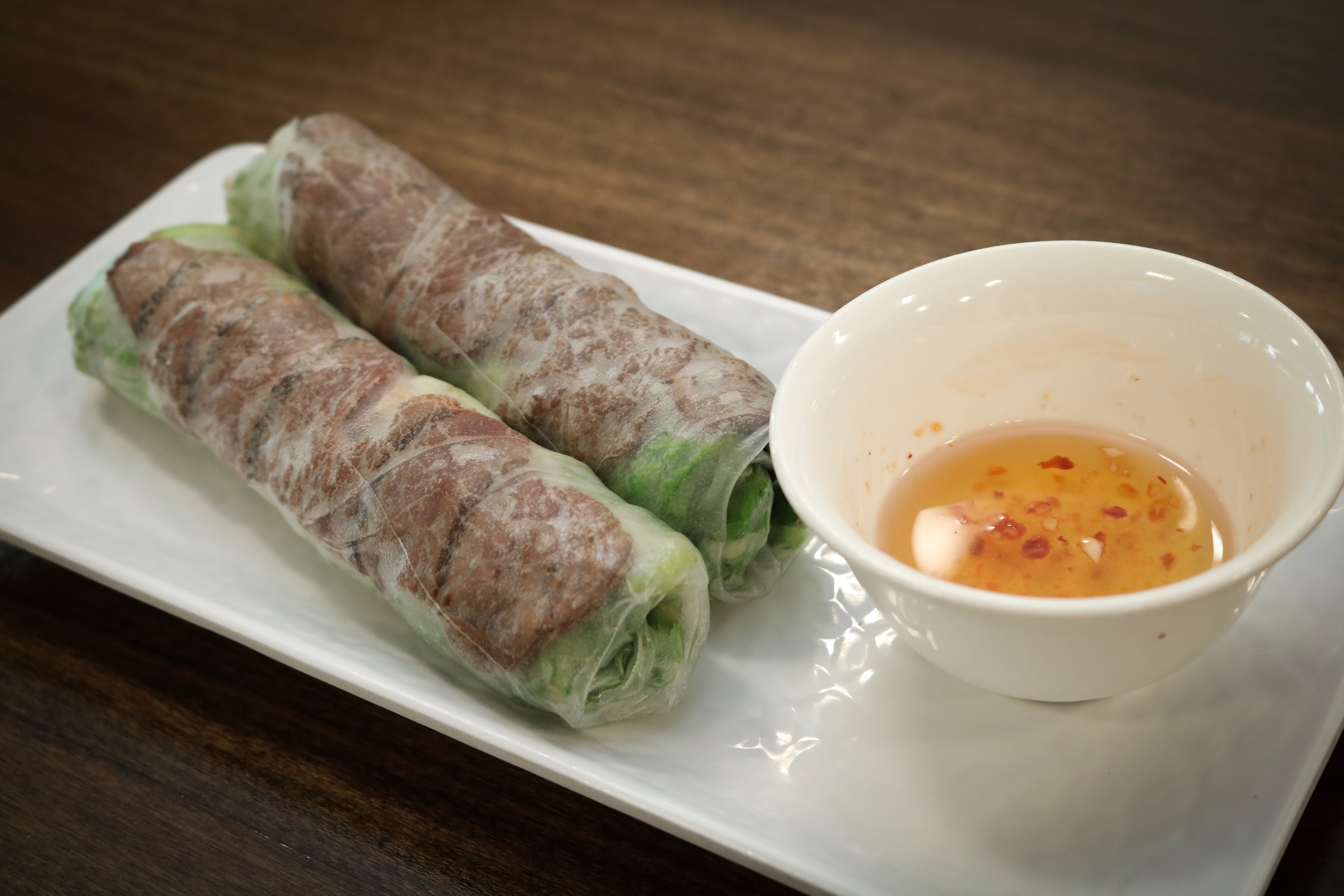 Order A4. Grilled Beef Spring Rolls (2) - Goi Cuon Bo Nuong food online from Pho Bowl & Grill store, Oceanside on bringmethat.com