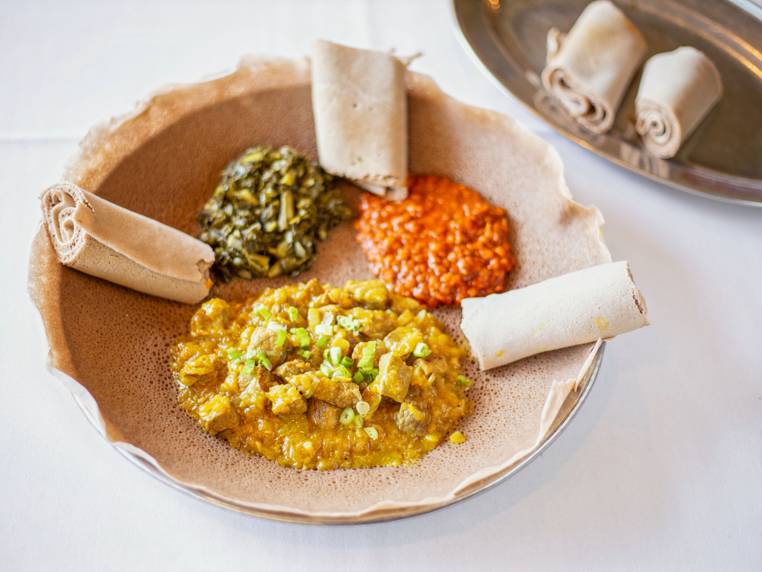 Order E2. Meat Sampler for 2 People food online from Ethiopian Diamond Restaurant store, Chicago on bringmethat.com