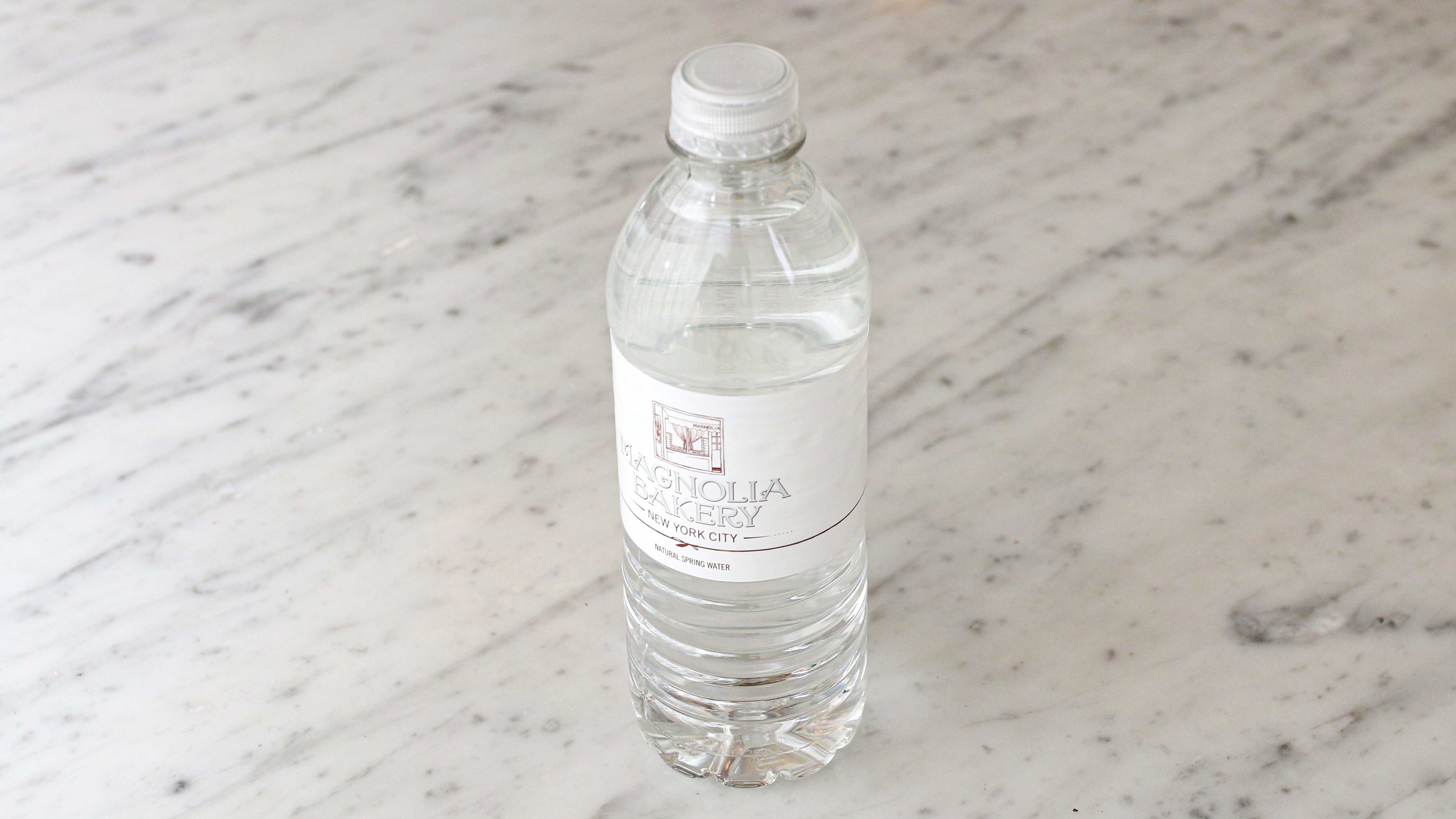 Order Bottled Water food online from Magnolia Bakery store, Chicago on bringmethat.com