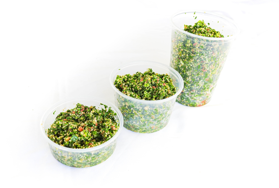 Order Tabouli. food online from Olive Pit Grill store, Brea on bringmethat.com