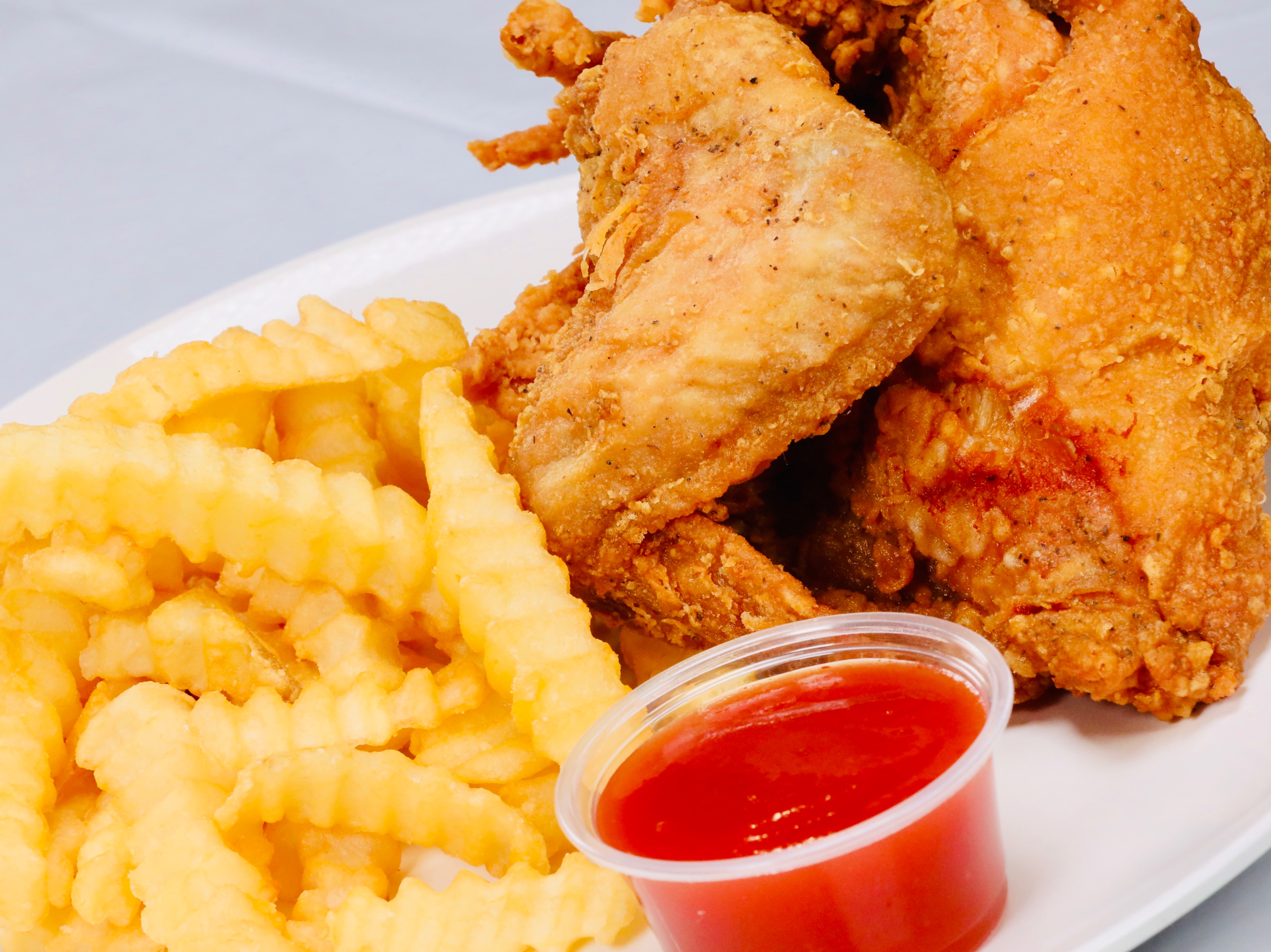 Order 1/4 White + Fries (One Wing One Breast) food online from Sam Sylks Chicken & Fish store, Cleveland on bringmethat.com