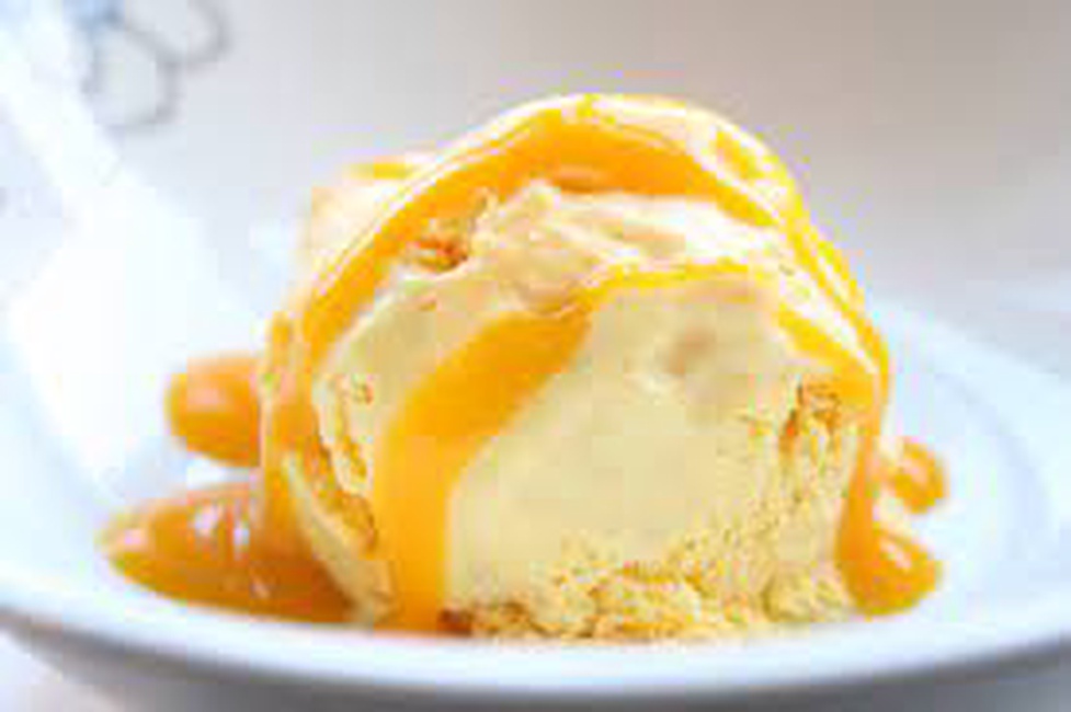 Order Vanilla Ice-cream topped with Mango Dressing food online from Deccan House store, San Francisco on bringmethat.com
