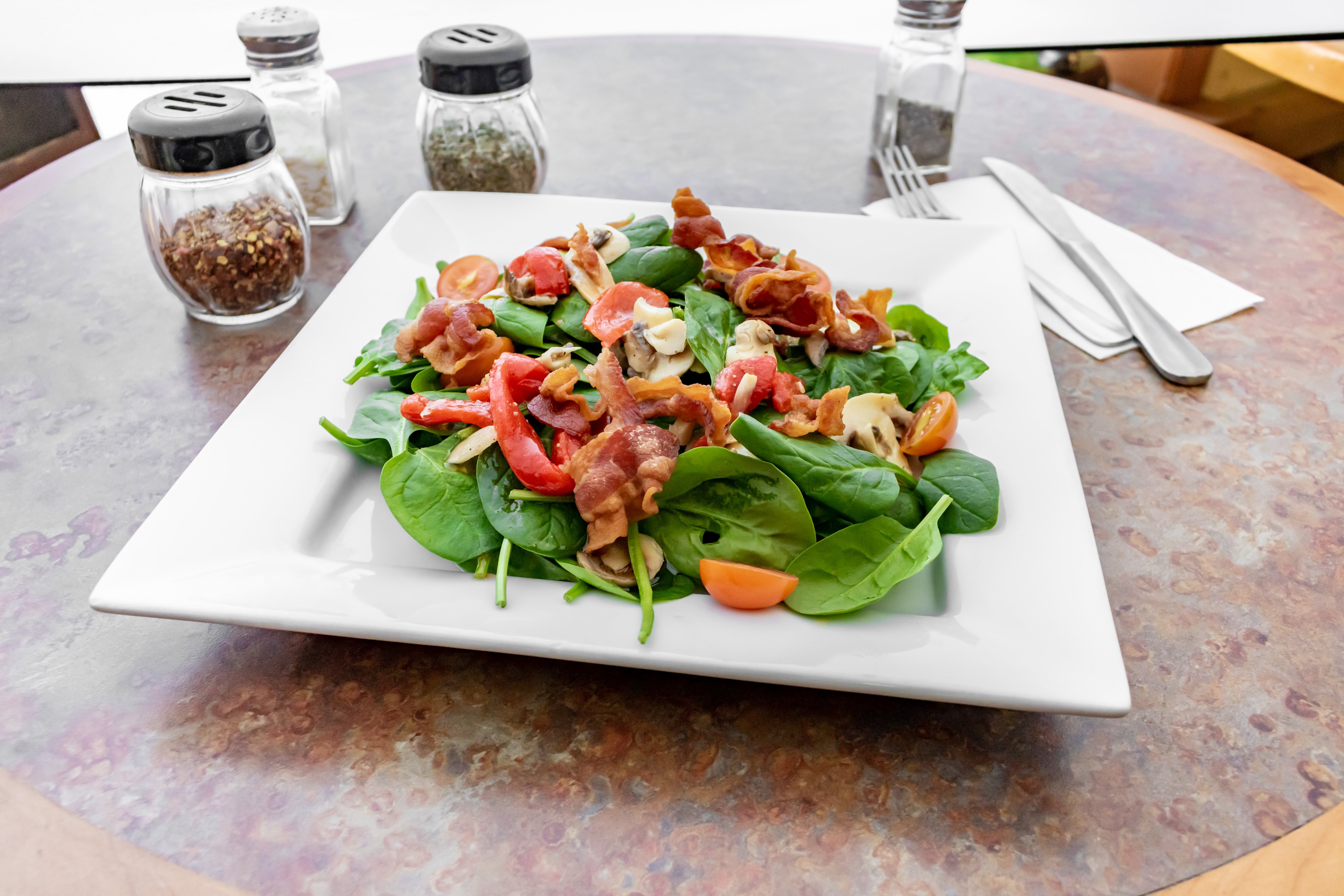 Order Baby Spinach Salad - Salad food online from Rino Pizzeria & Restaurant store, Burlington on bringmethat.com