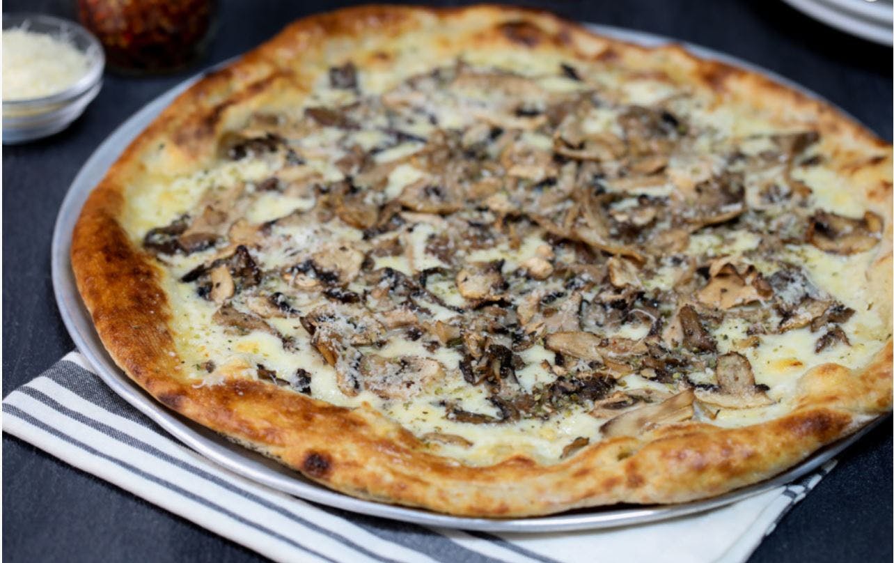 Order Neapolitan Funghi Pizza - 10'' food online from Patxi's Chicago Pizza store, San Francisco on bringmethat.com