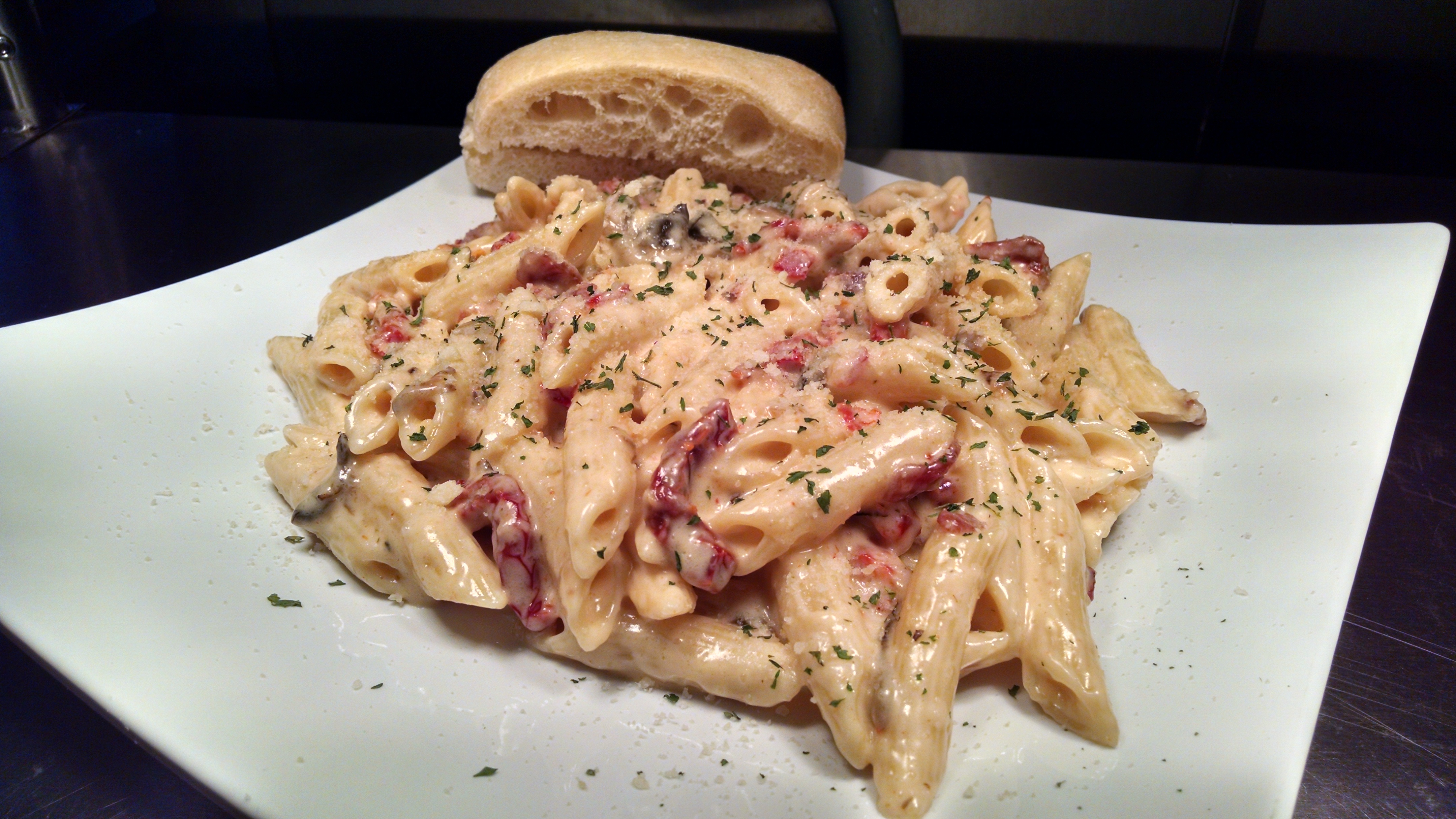 Order Penne Carbonara food online from Rocky's Pizza store, Huntersville on bringmethat.com
