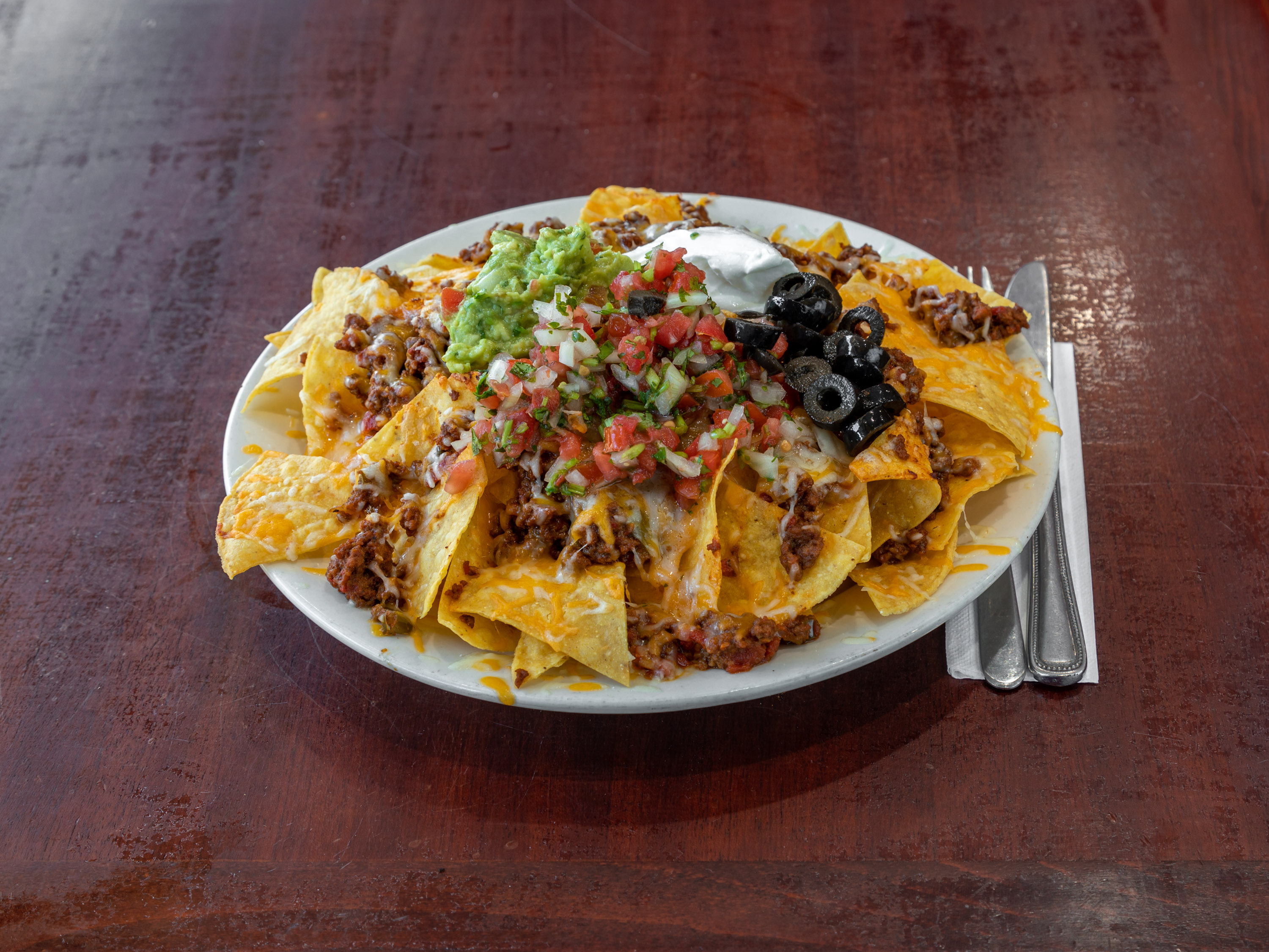Order Nachos food online from Picante store, Springfield on bringmethat.com
