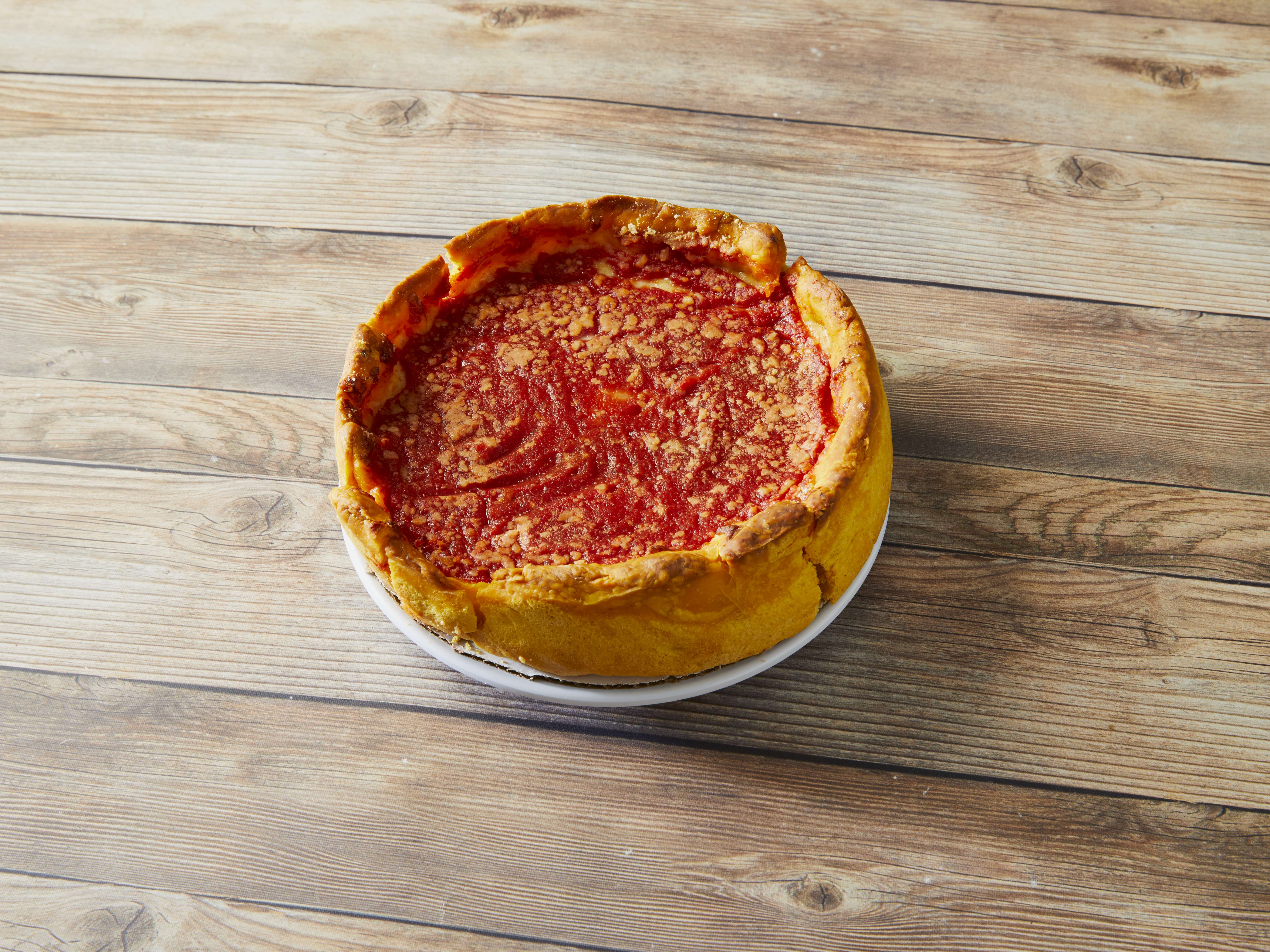 Order Deep Dish Cheese Pizza food online from Beggars Pizza store, Chicago on bringmethat.com