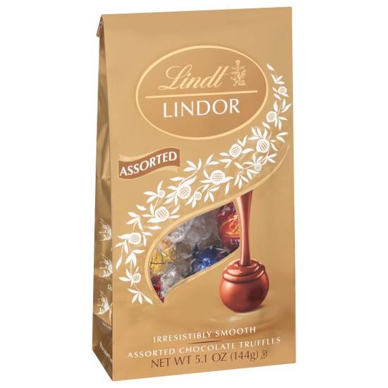 Order Lindt LINDOR Assorted Chocolate Truffles, Chocolate with Smooth, Melting Truffle Center, 5.1 oz. Bag food online from Cvs store, AURORA on bringmethat.com