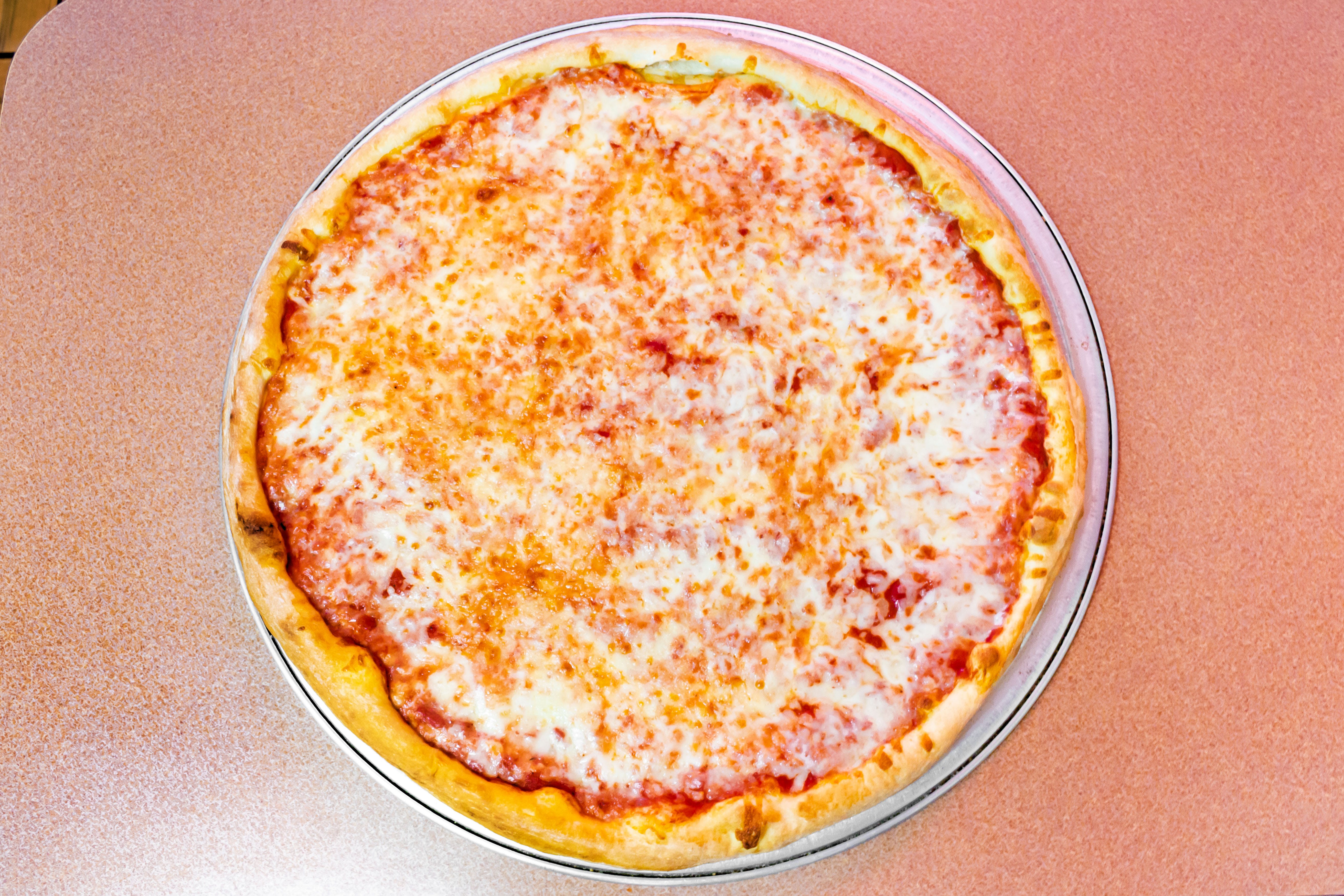 Order Cheese Pizza - Small 10" (6 Slices) food online from I Love NY Pizza store, Yonkers on bringmethat.com