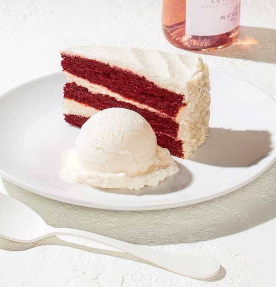 Order RED VELVET CAKE food online from California Pizza Kitchen store, King of Prussia on bringmethat.com