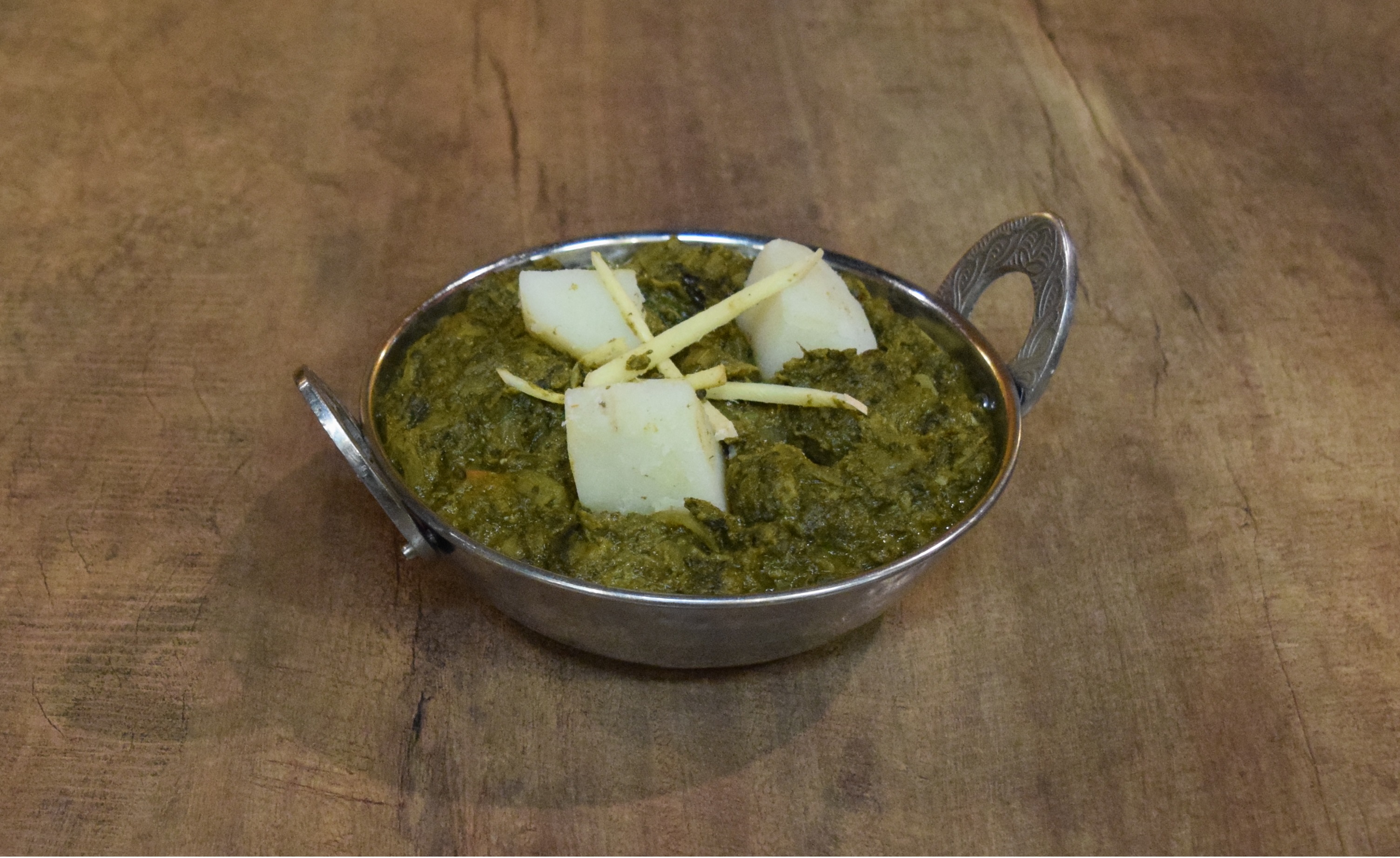 Order Saag Aloo food online from Sattva Indian store, Aliso Viejo on bringmethat.com