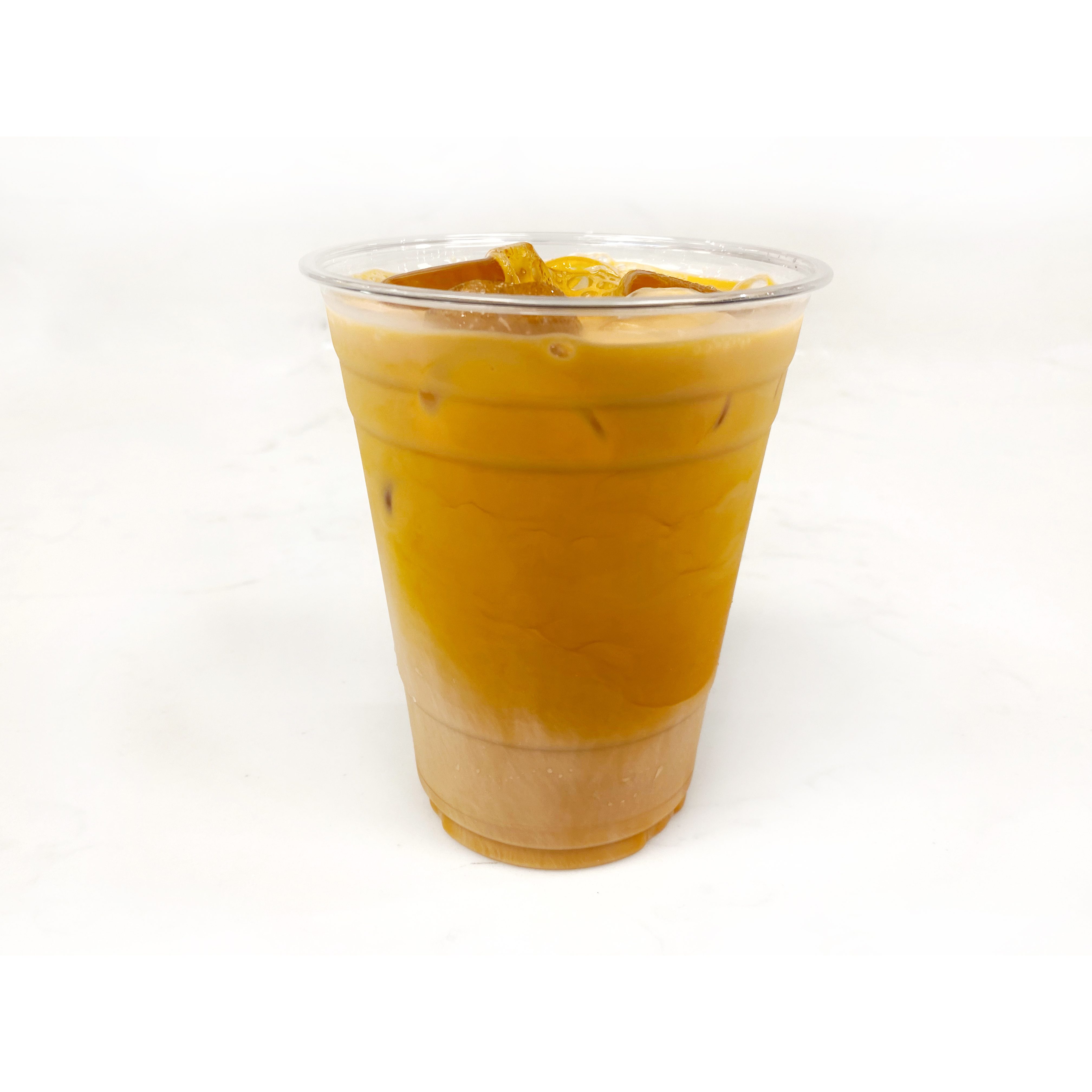 Order Thai Iced Tea food online from The Donuttery store, Huntington Beach on bringmethat.com