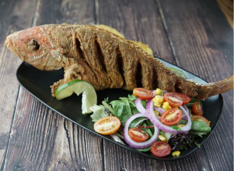 Order Pargo Frito food online from Noches De Colombia store, Hackensack on bringmethat.com