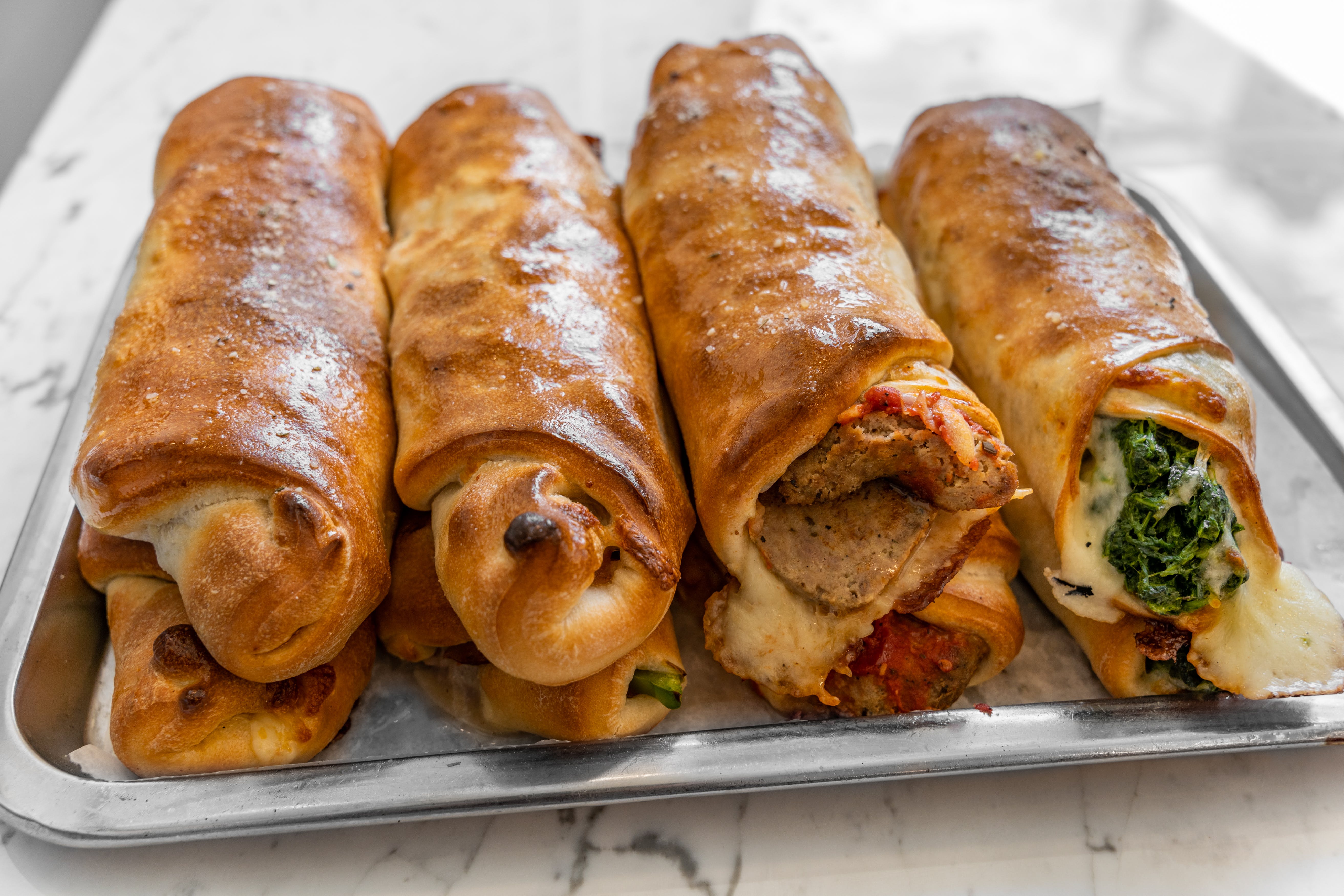 Order Pepperoni Pizza Roll - Roll food online from Roma's pizza store, New York on bringmethat.com