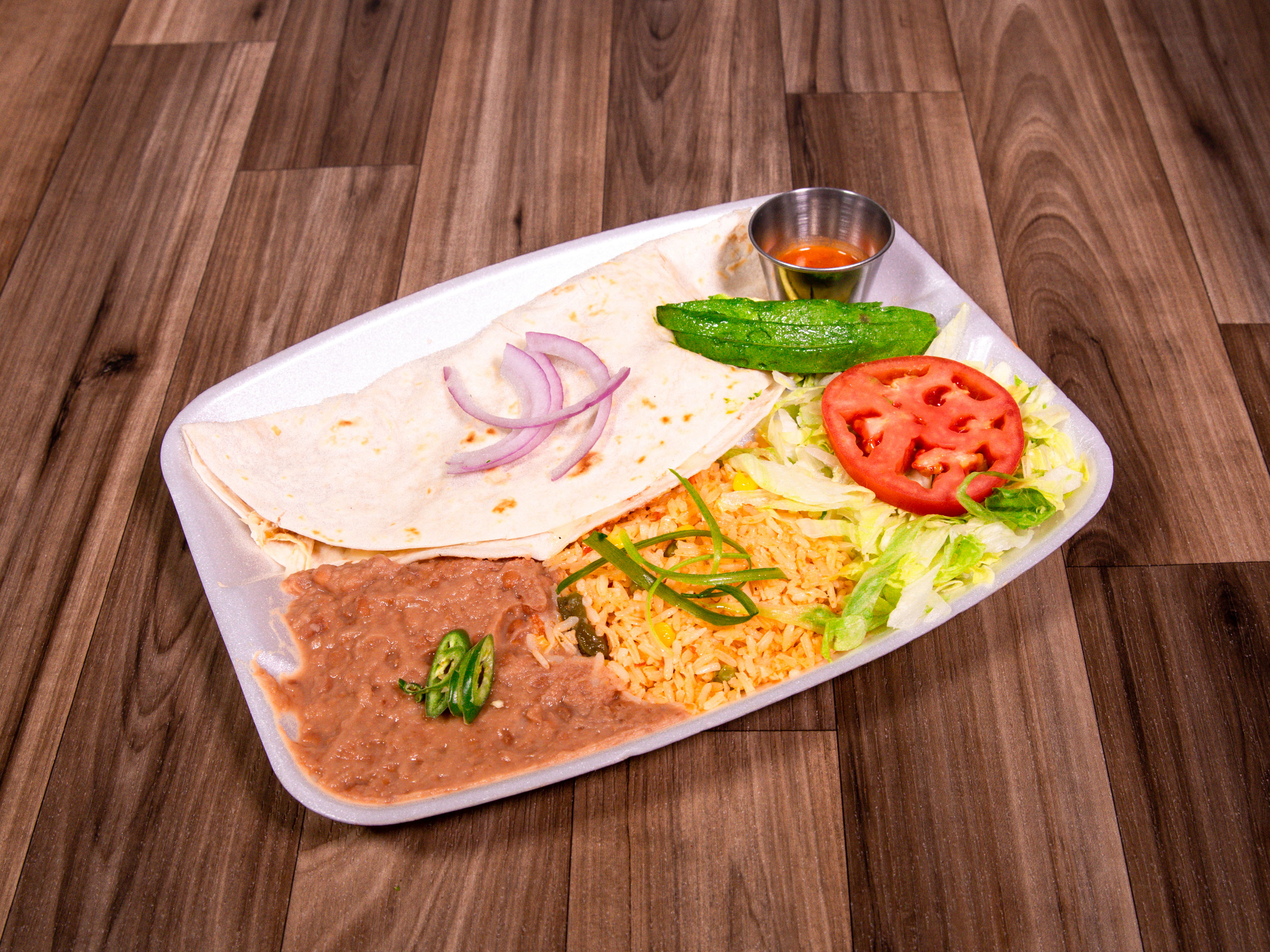 Order Quesadilla Plate food online from Cesar's Tacos store, Dallas on bringmethat.com