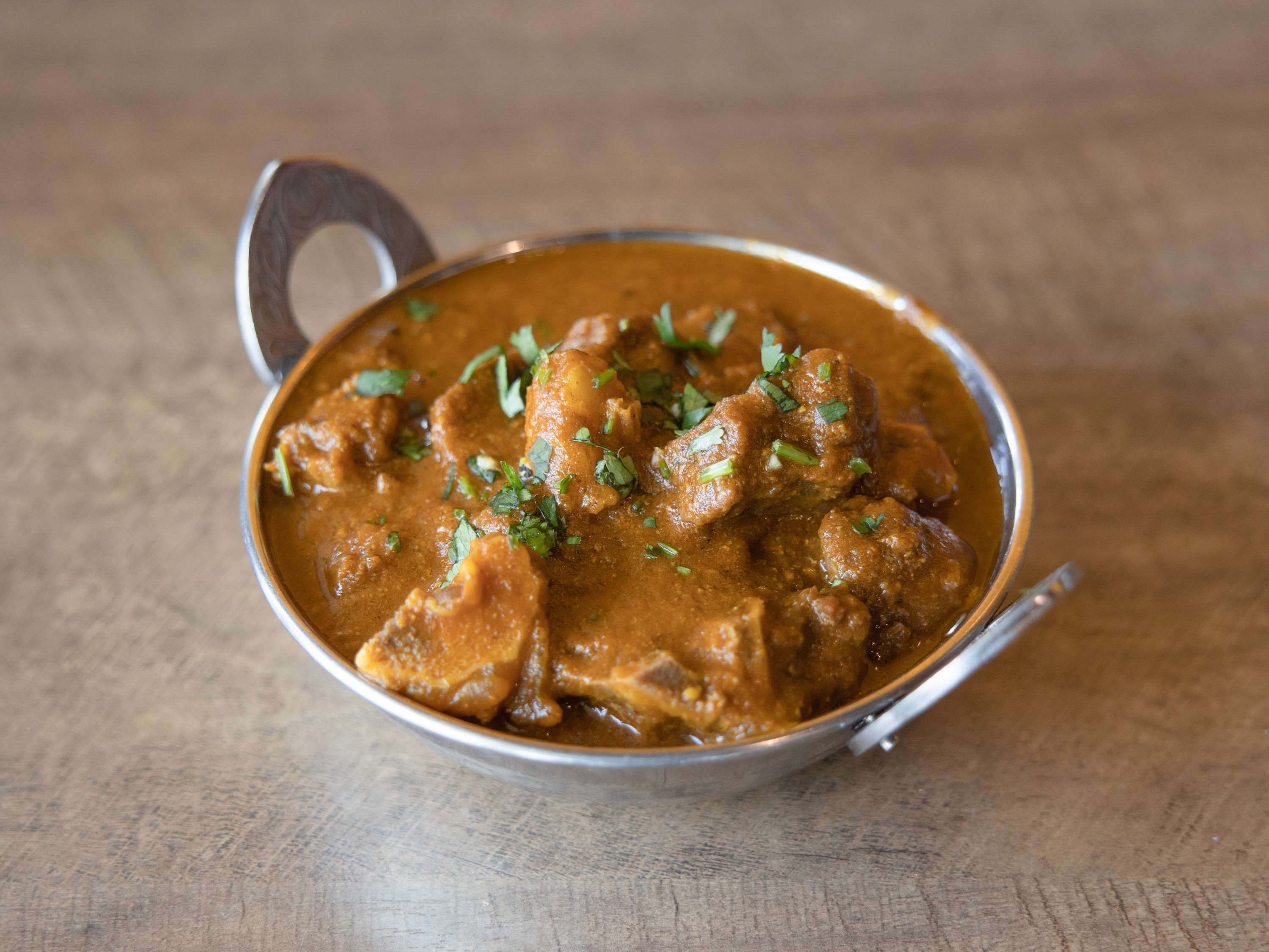 Order Goat Curry food online from Sattva Indian store, Aliso Viejo on bringmethat.com