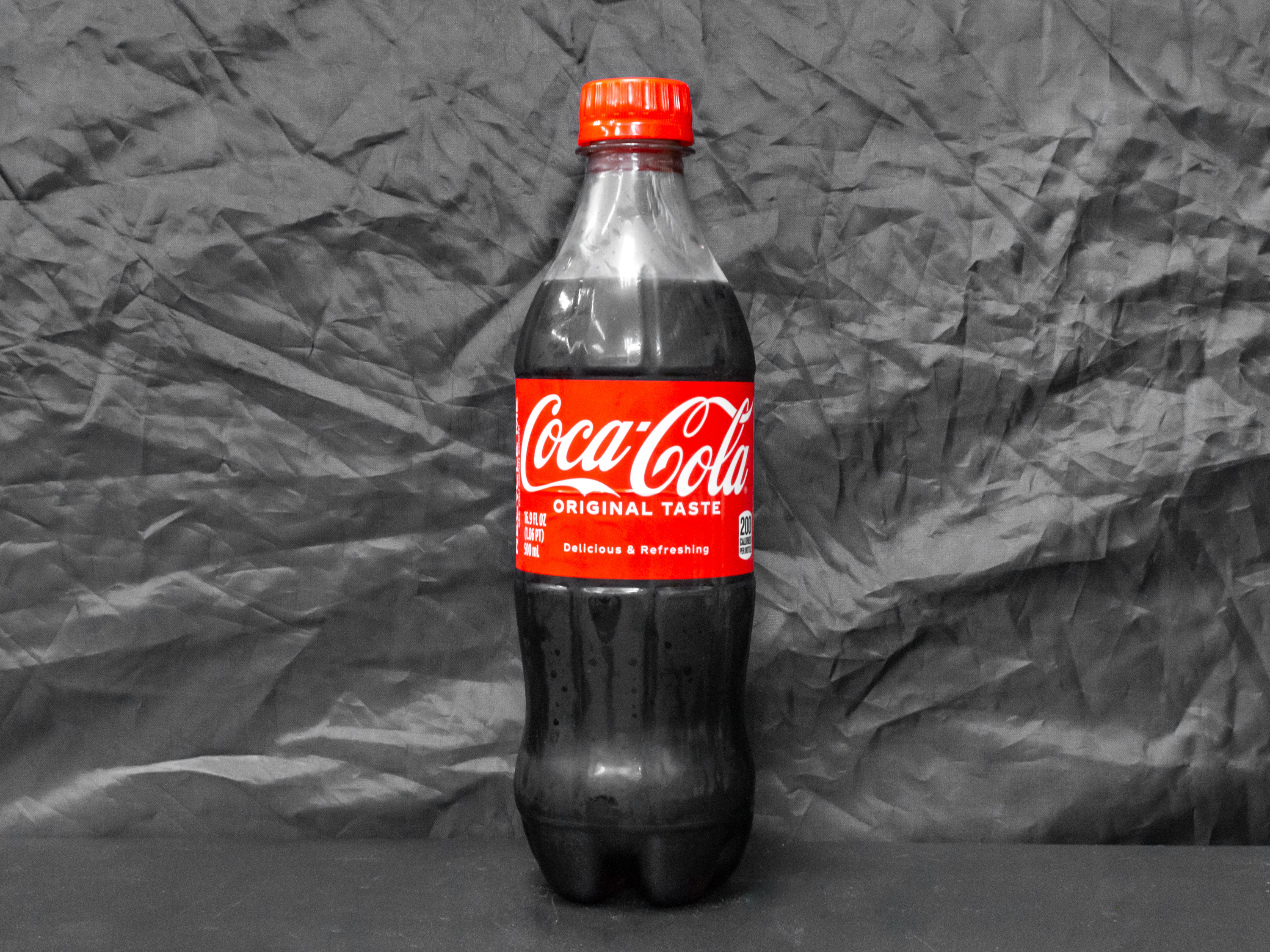 Order Coca Cola, 2 Liter Mixer food online from Logan Liquor store, Chicago on bringmethat.com