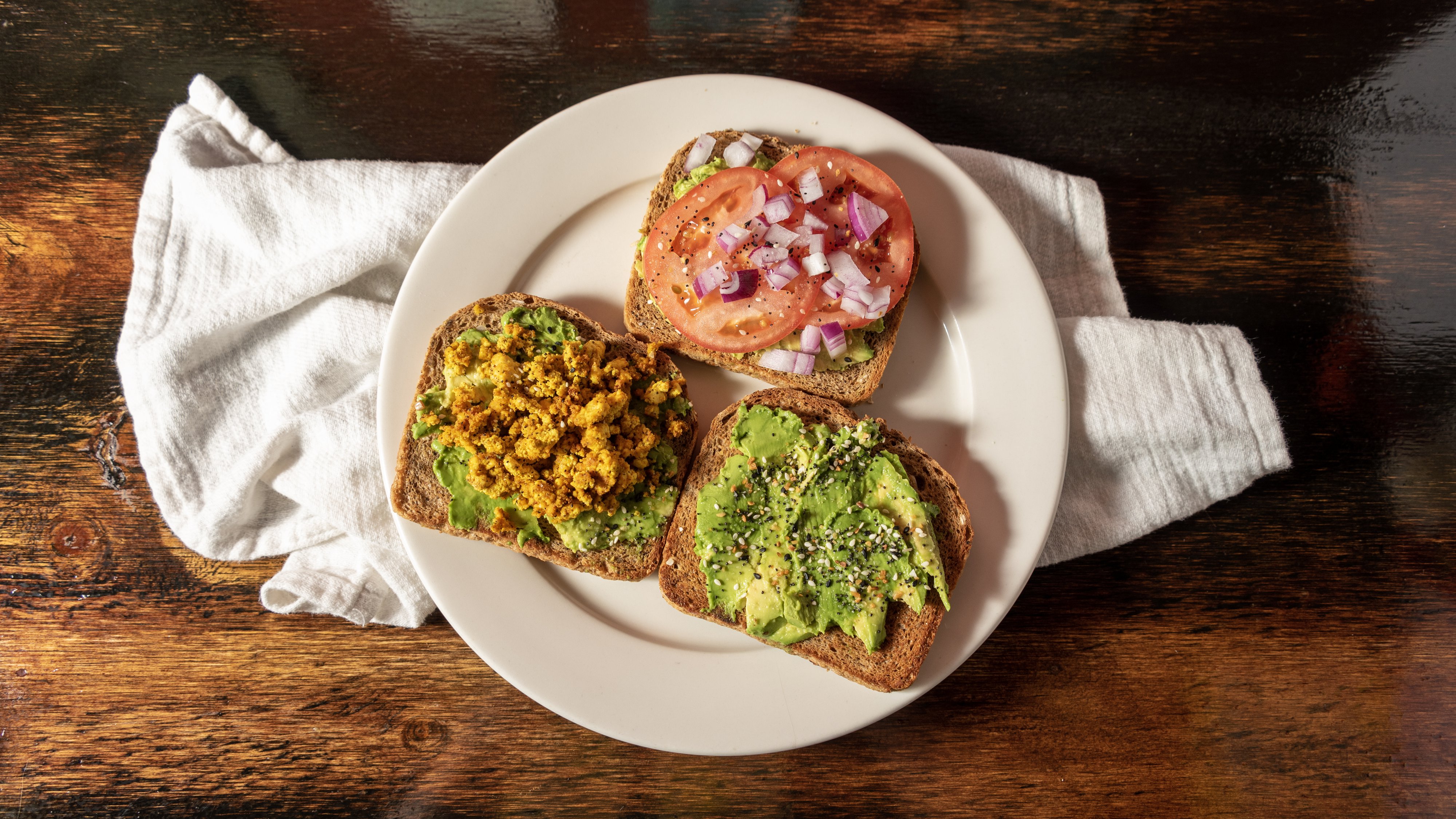 Order Avocado Toast Trio food online from Revolutionary Lounge & Cafe store, Toms River on bringmethat.com