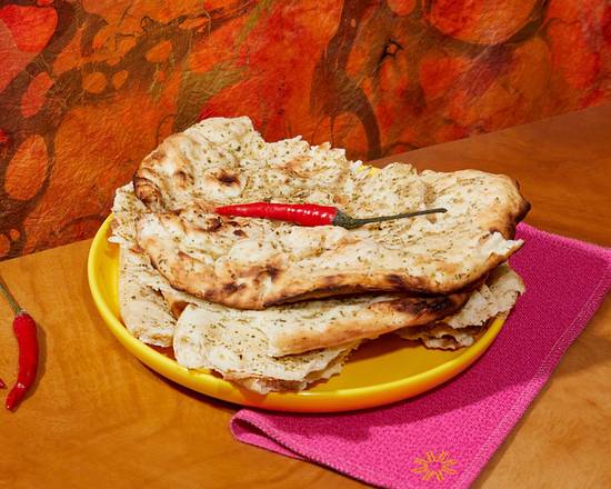 Order Garlic Naan food online from Matchstick Masala store, Fort Collins on bringmethat.com