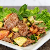 Order Spicy Beef Salad food online from Rice By Mama 2 store, Ventura on bringmethat.com