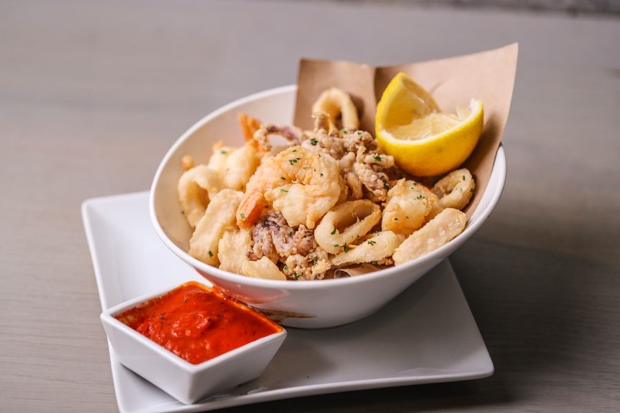 Order Frittura di Mare (fried calamari and shrimp) food online from PizzArte store, New York on bringmethat.com