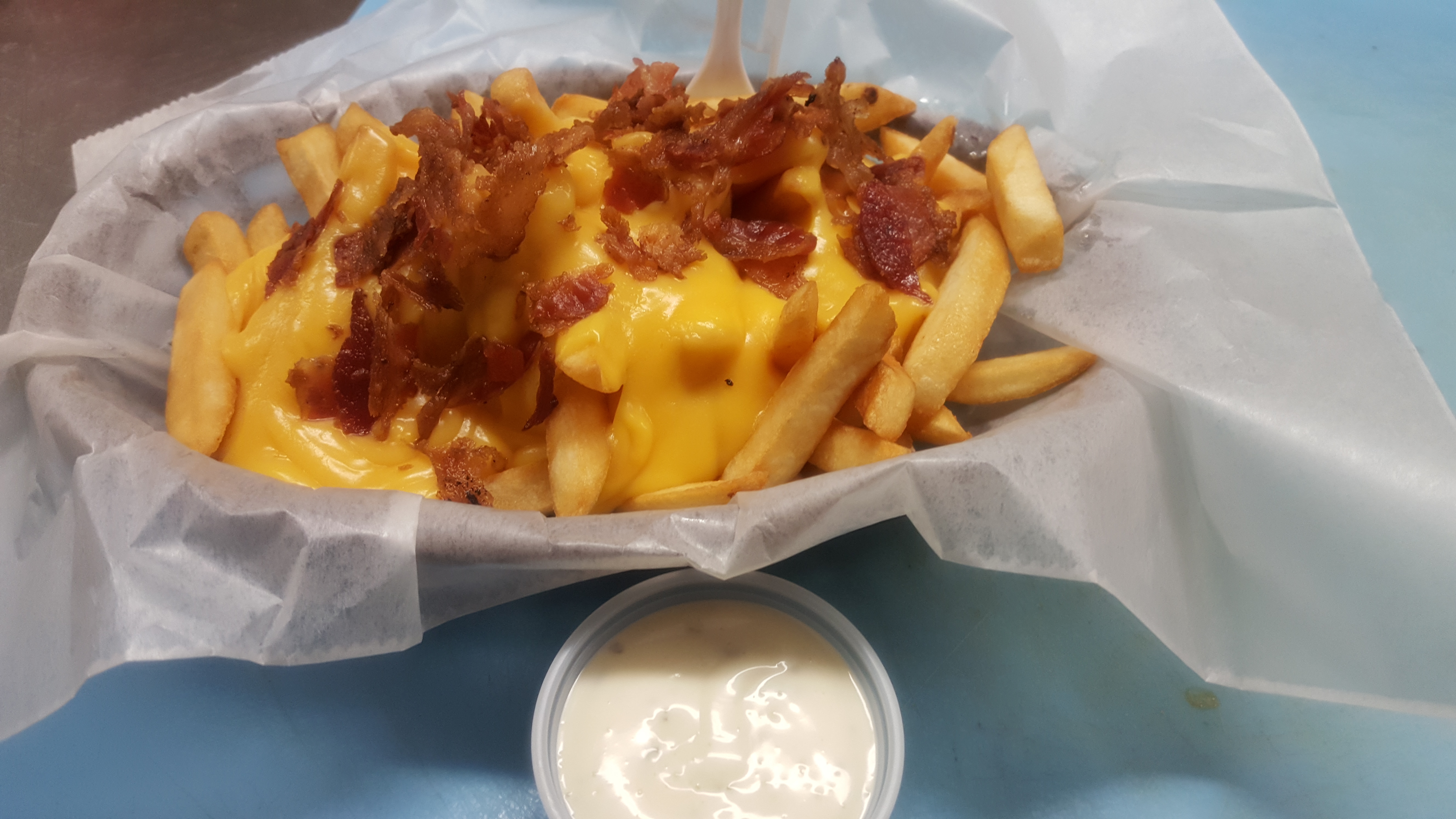 Order Loaded Fries food online from Heywood Kitchen store, Wilmington on bringmethat.com
