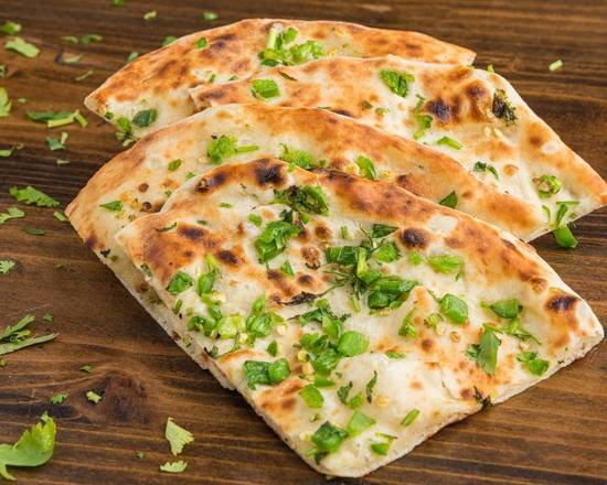Order Bullet Naan food online from Aga Restaurant & Catering store, Houston on bringmethat.com