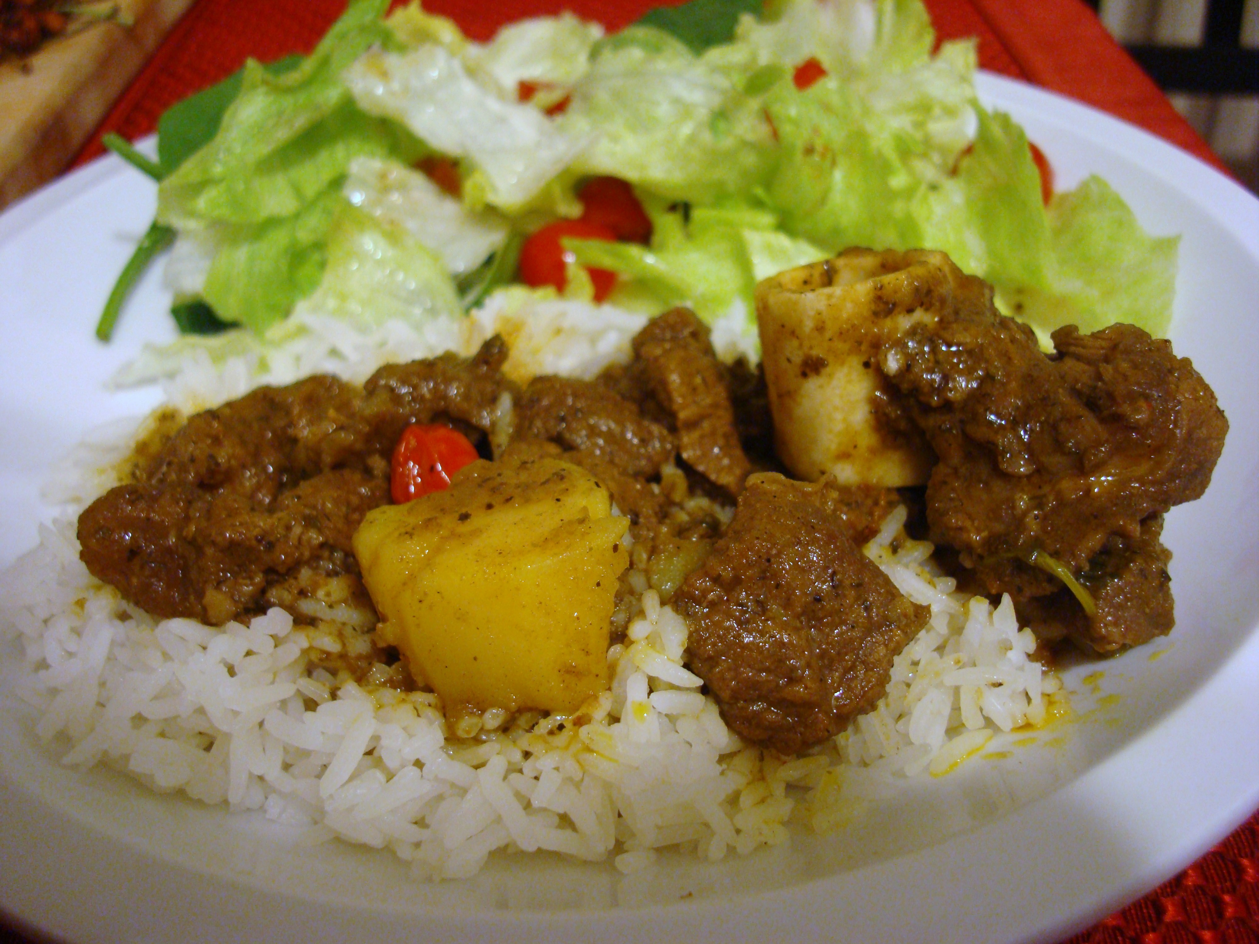 Order Curry Goat food online from Caribbean Quizine store, West Nyack on bringmethat.com