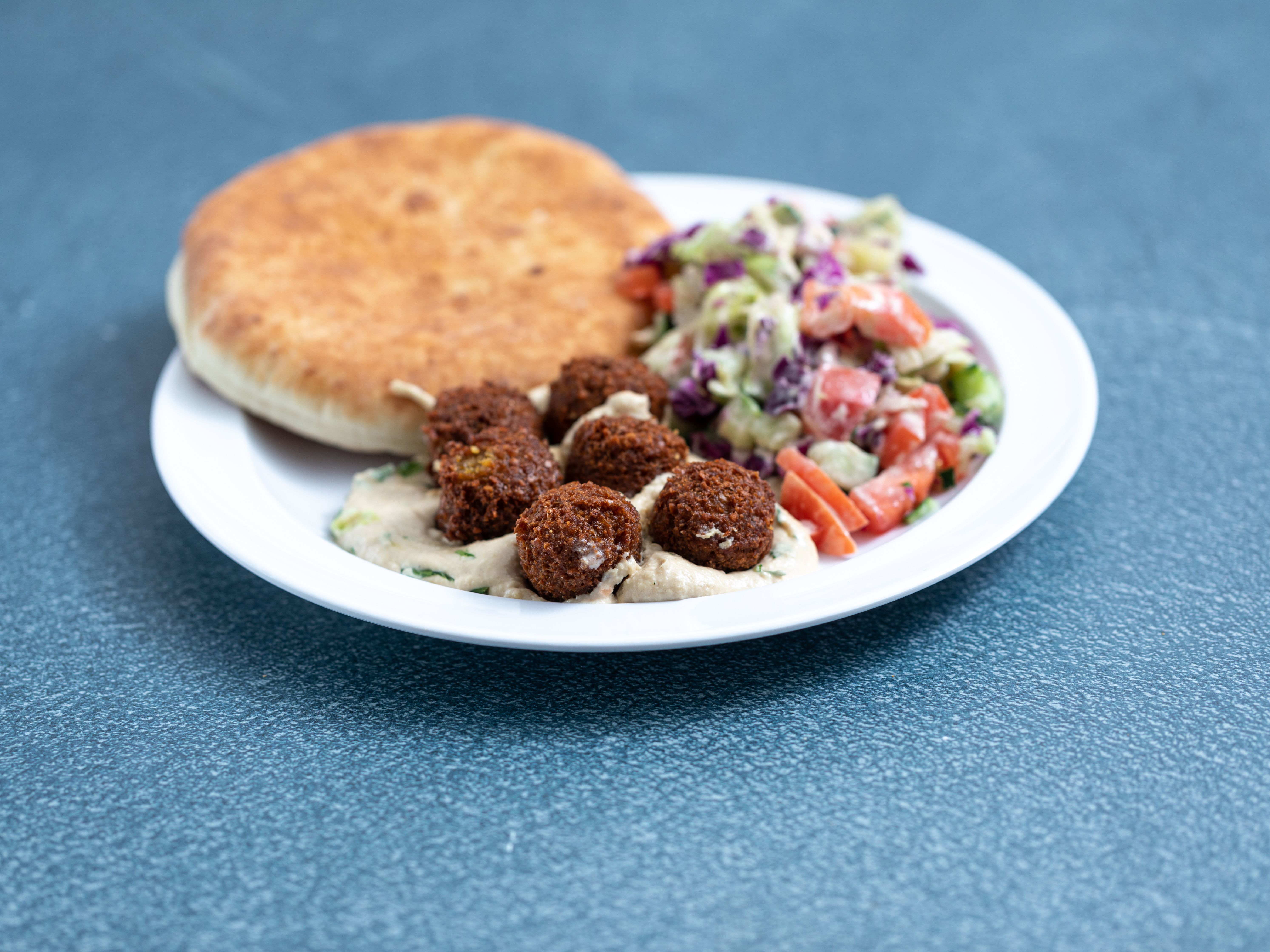 Order Falafel, Hummus and Salad Plate food online from Rami's store, Brookline on bringmethat.com