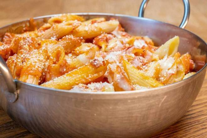 Order Vodka Sauce Penne Pasta food online from Mr. Moto Pizza House store, San Diego on bringmethat.com