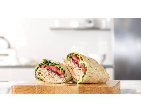 Order ROAST TURKEY & SWISS WRAP food online from Arby's store, Chicago on bringmethat.com