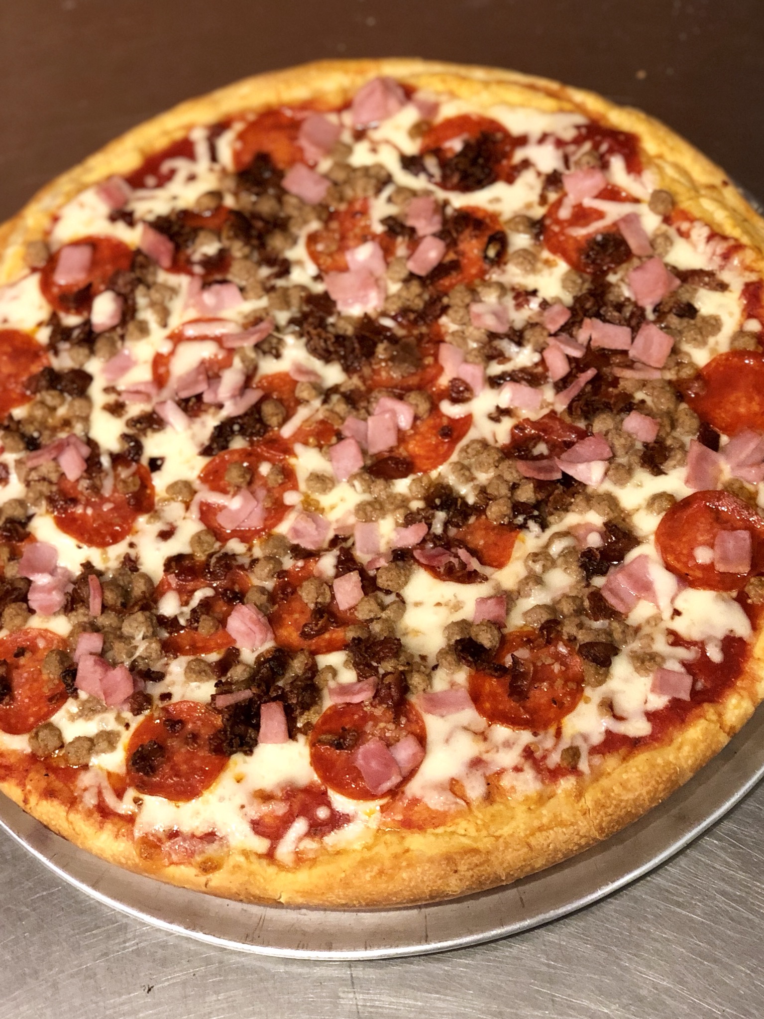 Order Meatlover’s Pan Pizza food online from Aldo & Manny Pizza Pasta store, Philadelphia on bringmethat.com